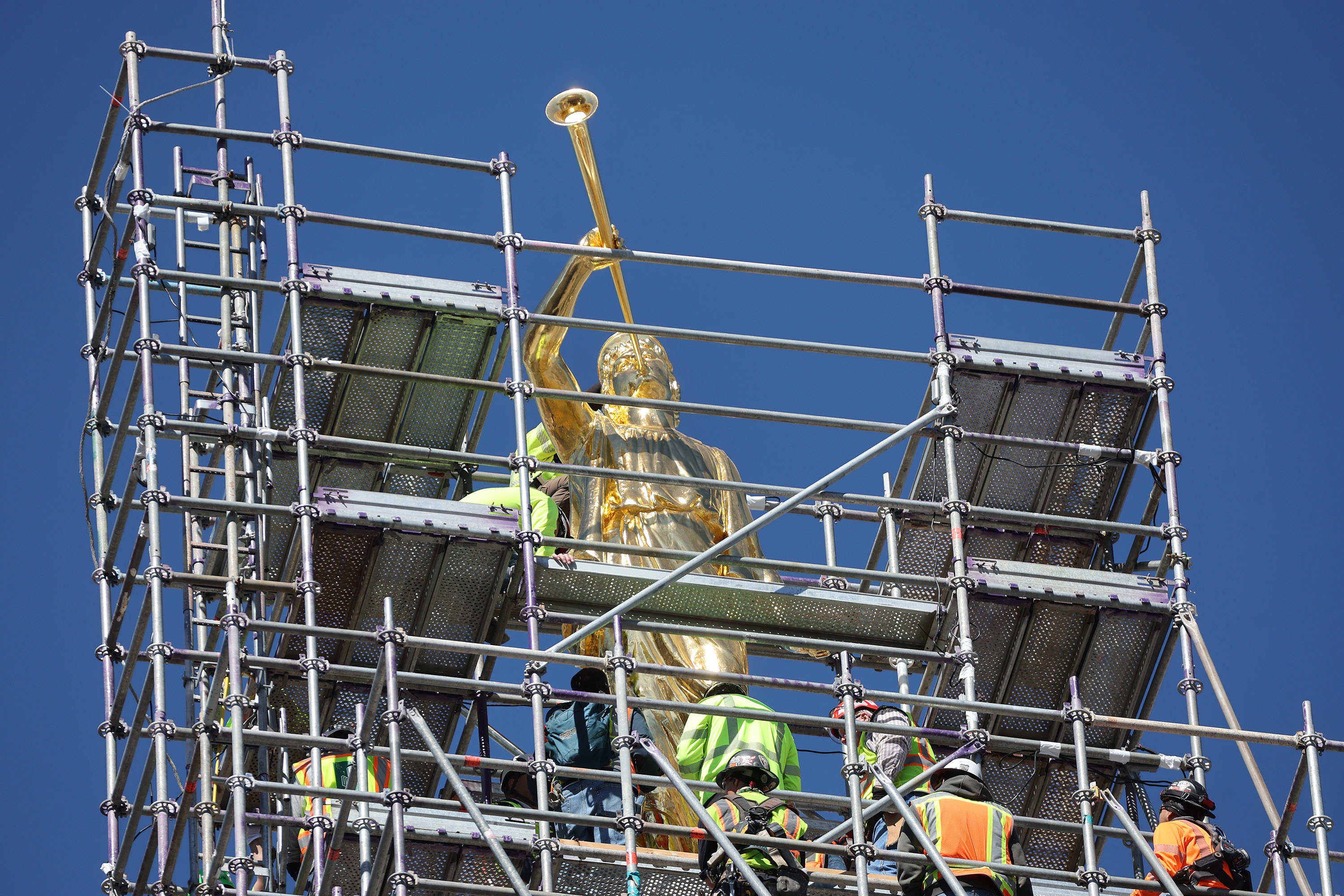 Angel Moroni is raised atop the Salt Lake Temple in Salt Lake City on Tuesday, April 2, 2024.