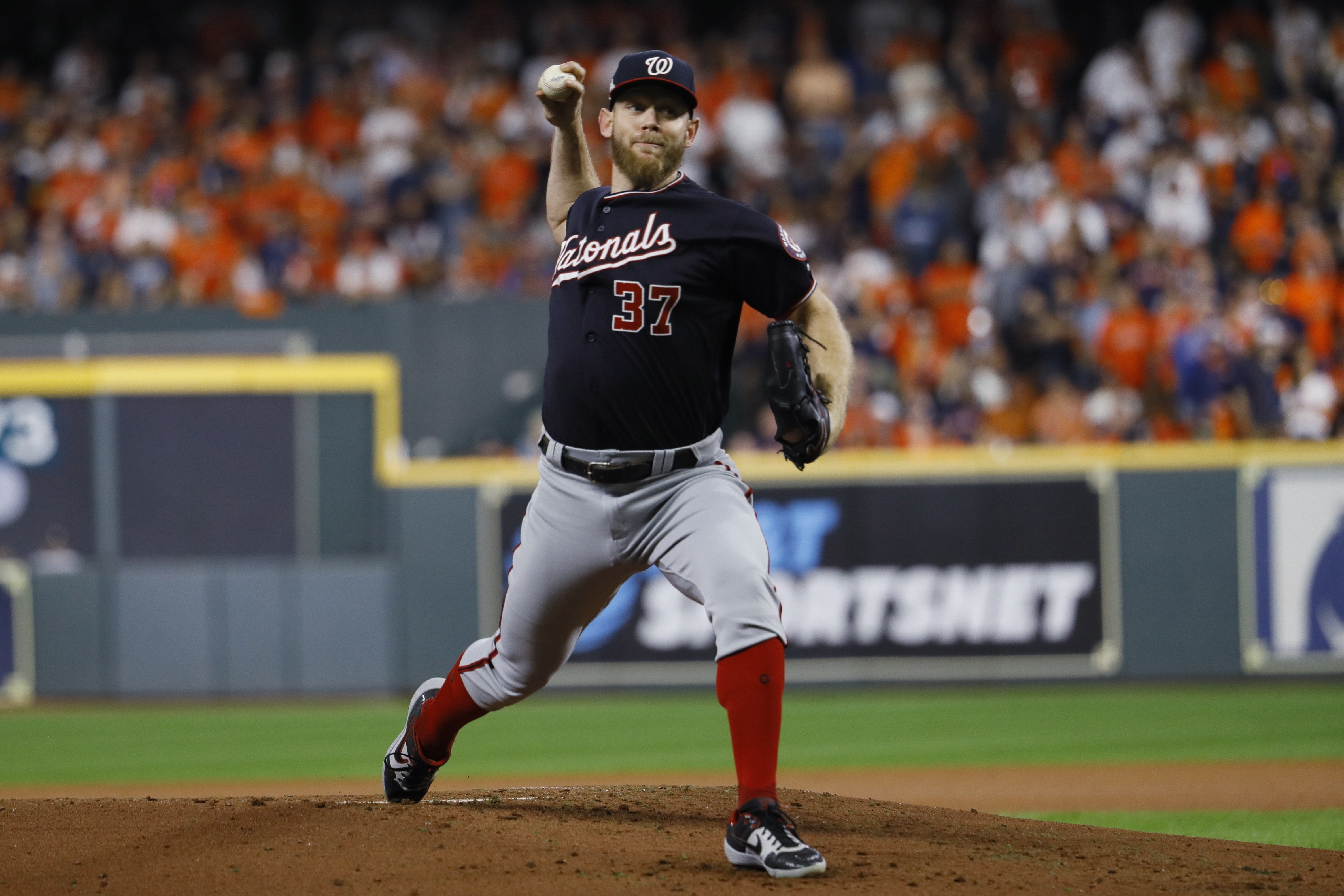 FILE - Washington Nationals starting pitcher Stephen Strasburg throws during the first inning of Game 6 of the baseball World Series against the Houston Astros on Oct. 29, 2019, in Houston. Strasburg, the 2019 World Series MVP whose career was derailed by injuries, officially was listed by Major League Baseball on Saturday, April 6, 2024, as being retired. 