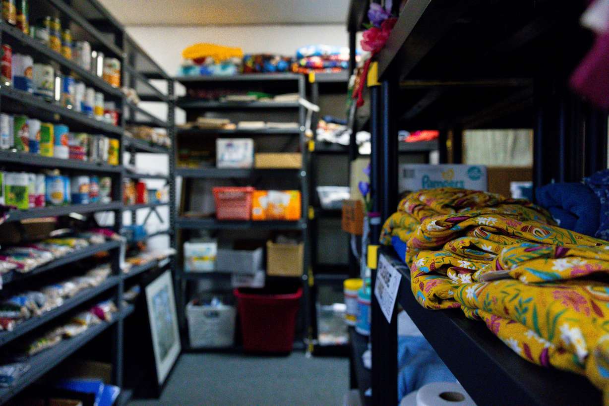 Donations line the shelves at Utah Valley Refugees in Provo on March 26.