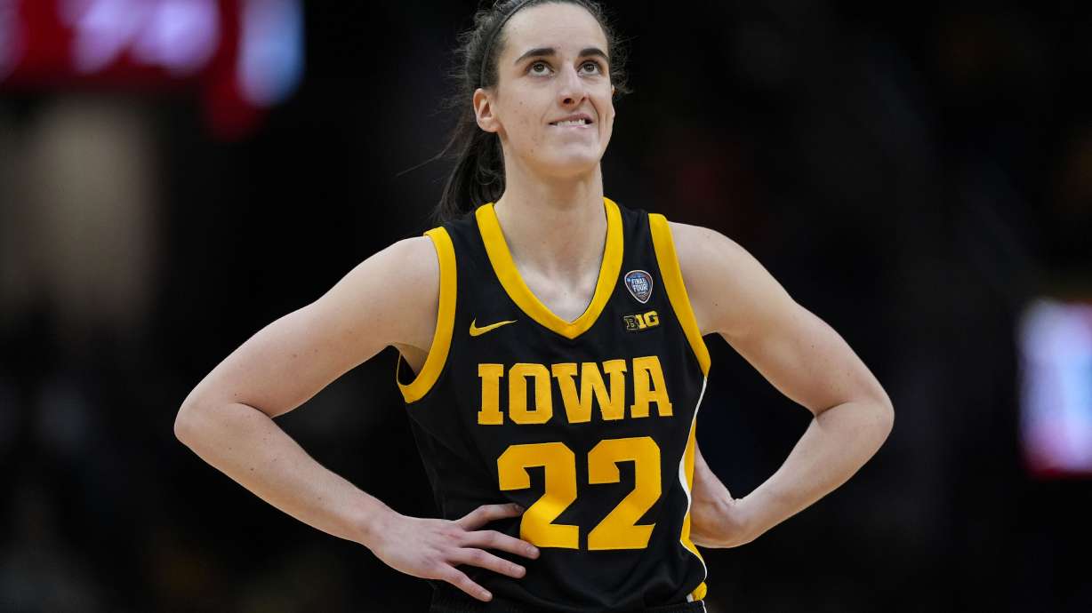 Iowa guard Caitlin Clark stands on the court during the second half of the Final Four college basketball championship game against South Carolina in the women's NCAA Tournament, Sunday, April 7, 2024, in Cleveland.