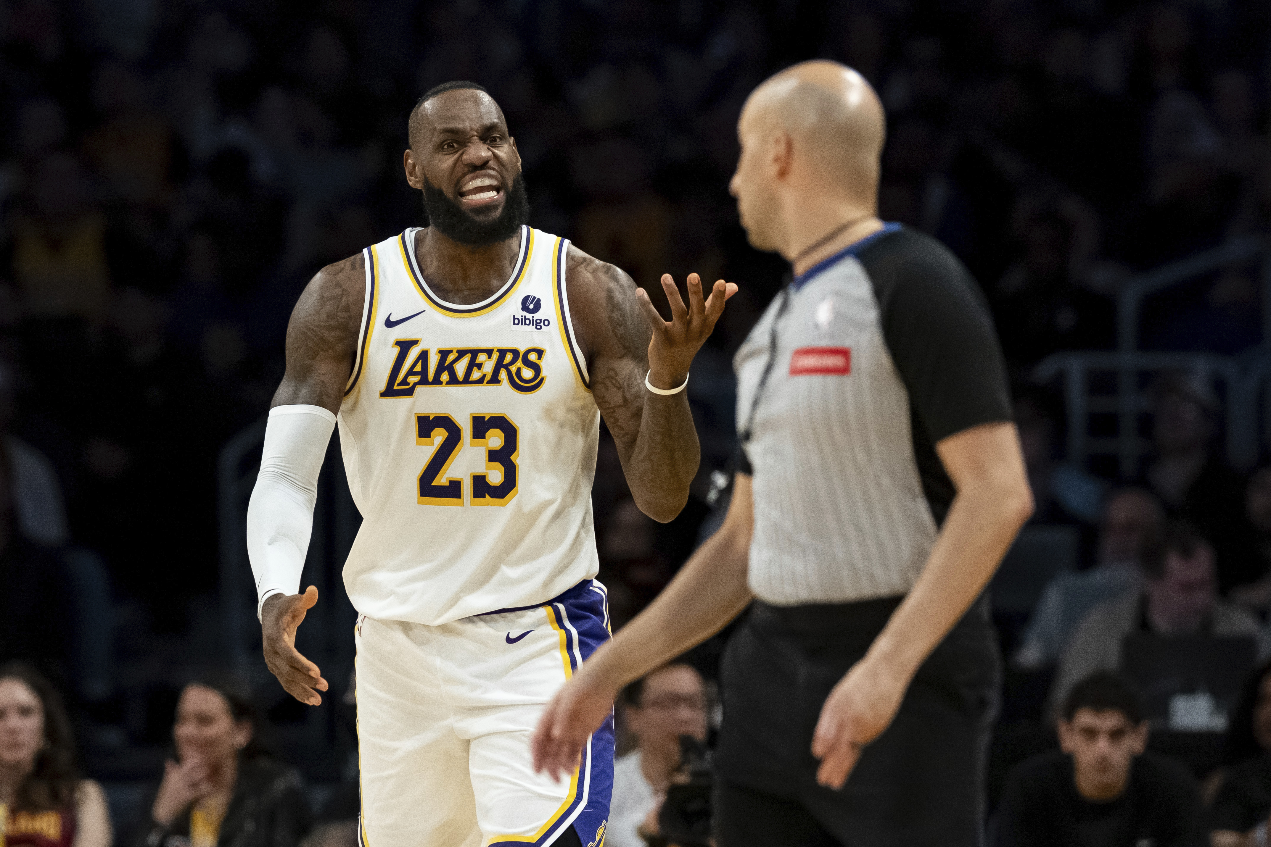 Los Angeles Lakers forward LeBron James (23) reacts after being called for a foul during the second half of an NBA basketball game against the Cleveland Cavaliers, Saturday, April 6, 2024, in Los Angeles. 