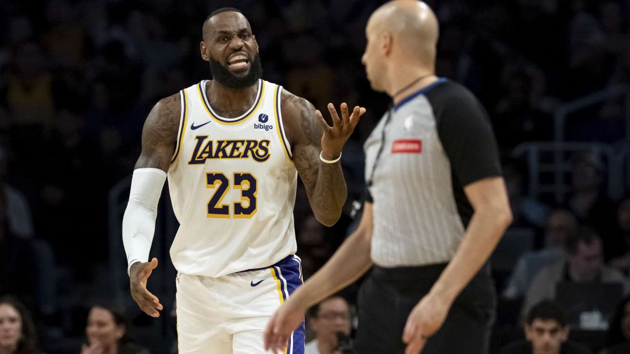 Los Angeles Lakers forward LeBron James (23) reacts after being called for a foul during the second half of an NBA basketball game against the Cleveland Cavaliers, Saturday, April 6, 2024, in Los Angeles.