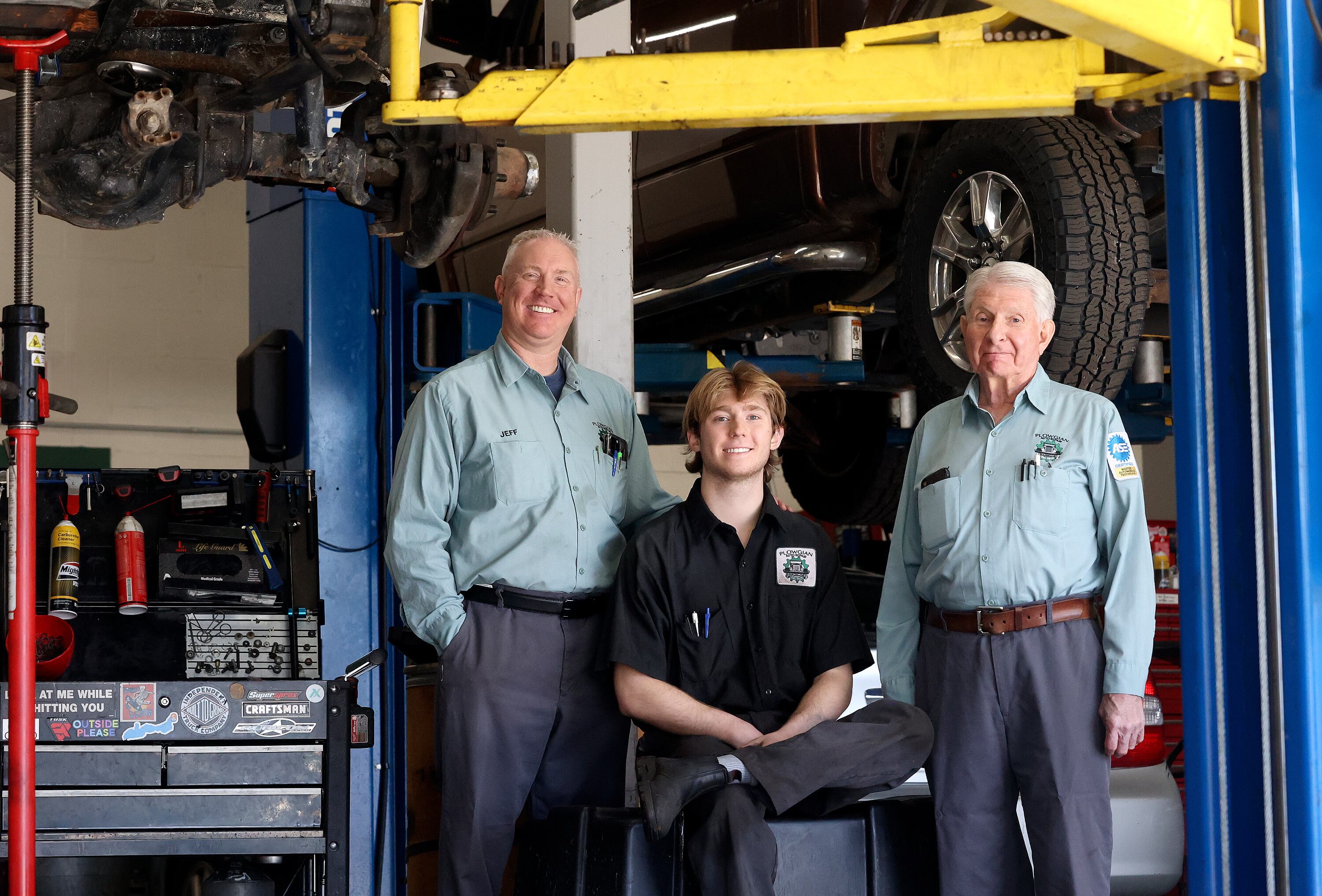 Jeff Plowgian, Seth Plowgian and Larry Plowgian pose for a portrait at Plowgian Auto Repair in Millcreek on March 18. The business has been in the family for five generations.