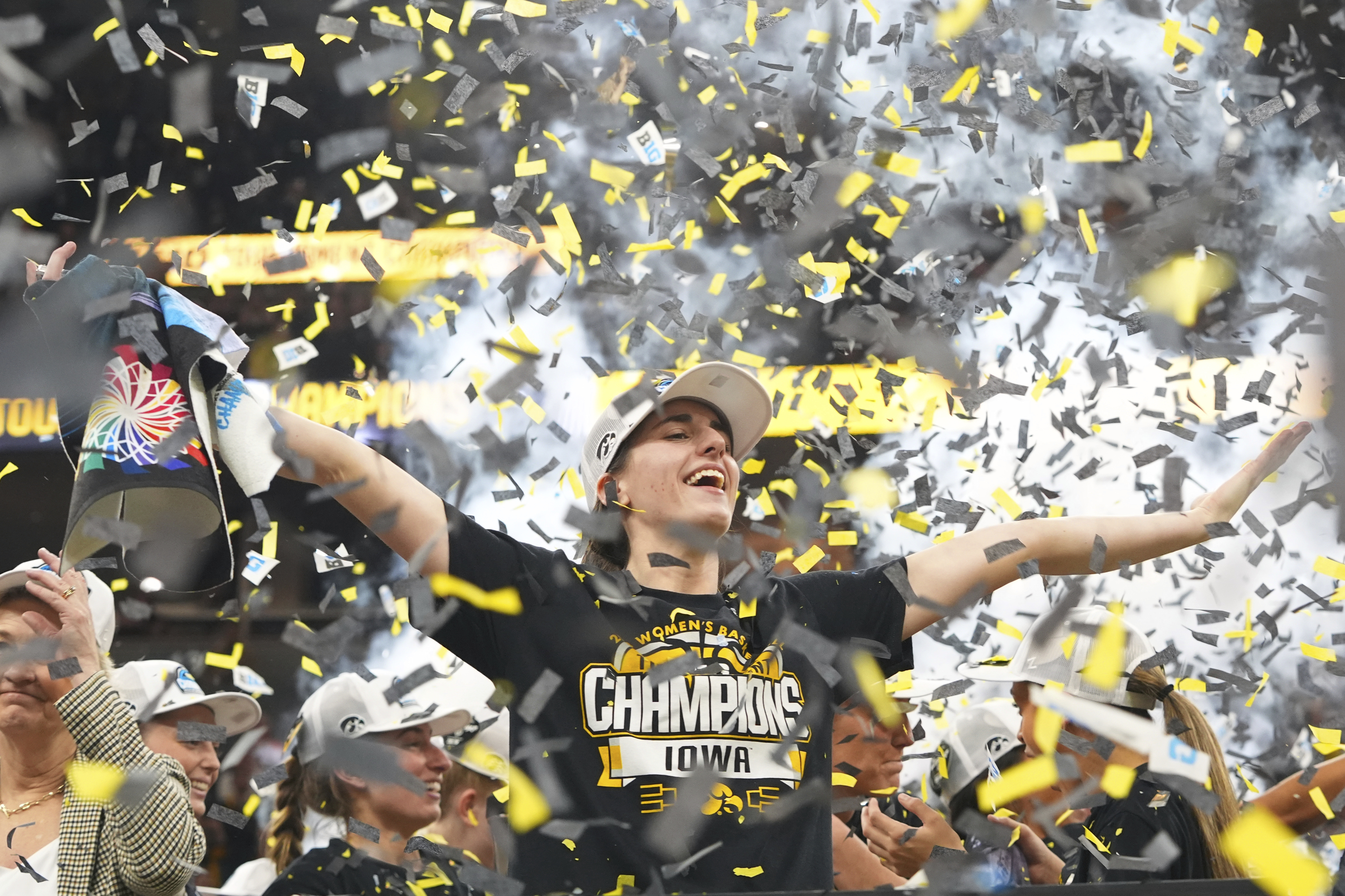 Iowa guard Caitlin Clark celebrates after the overtime win of an NCAA college basketball game against Nebraska in the final of the Big Ten women's tournament, Sunday, March 10, 2024, in Minneapolis.