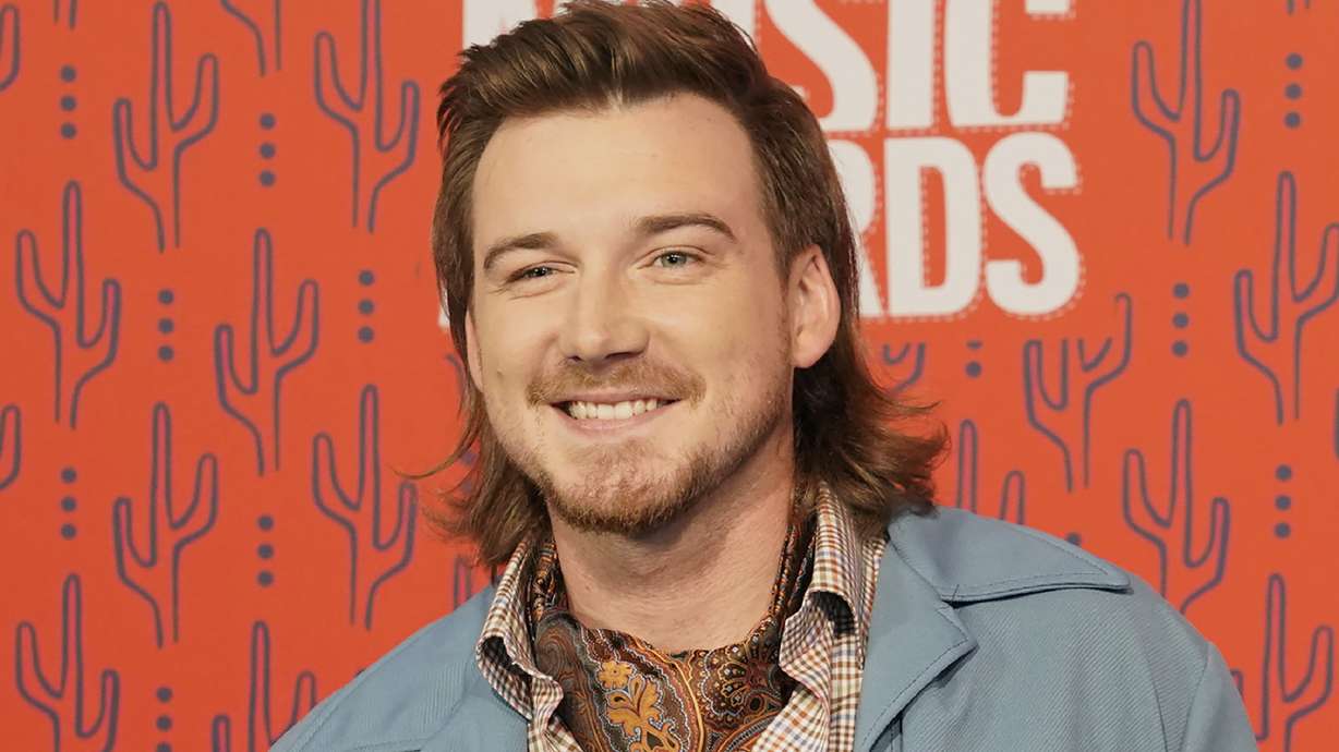 In this June 5, 2019, Morgan Wallen arrives at the CMT Music Awards at the Bridgestone Arena in Nashville, Tenn. Wallen has been arrested after police say he threw a chair off the rooftop of a newly opened six-story bar in downtown Nashville.
