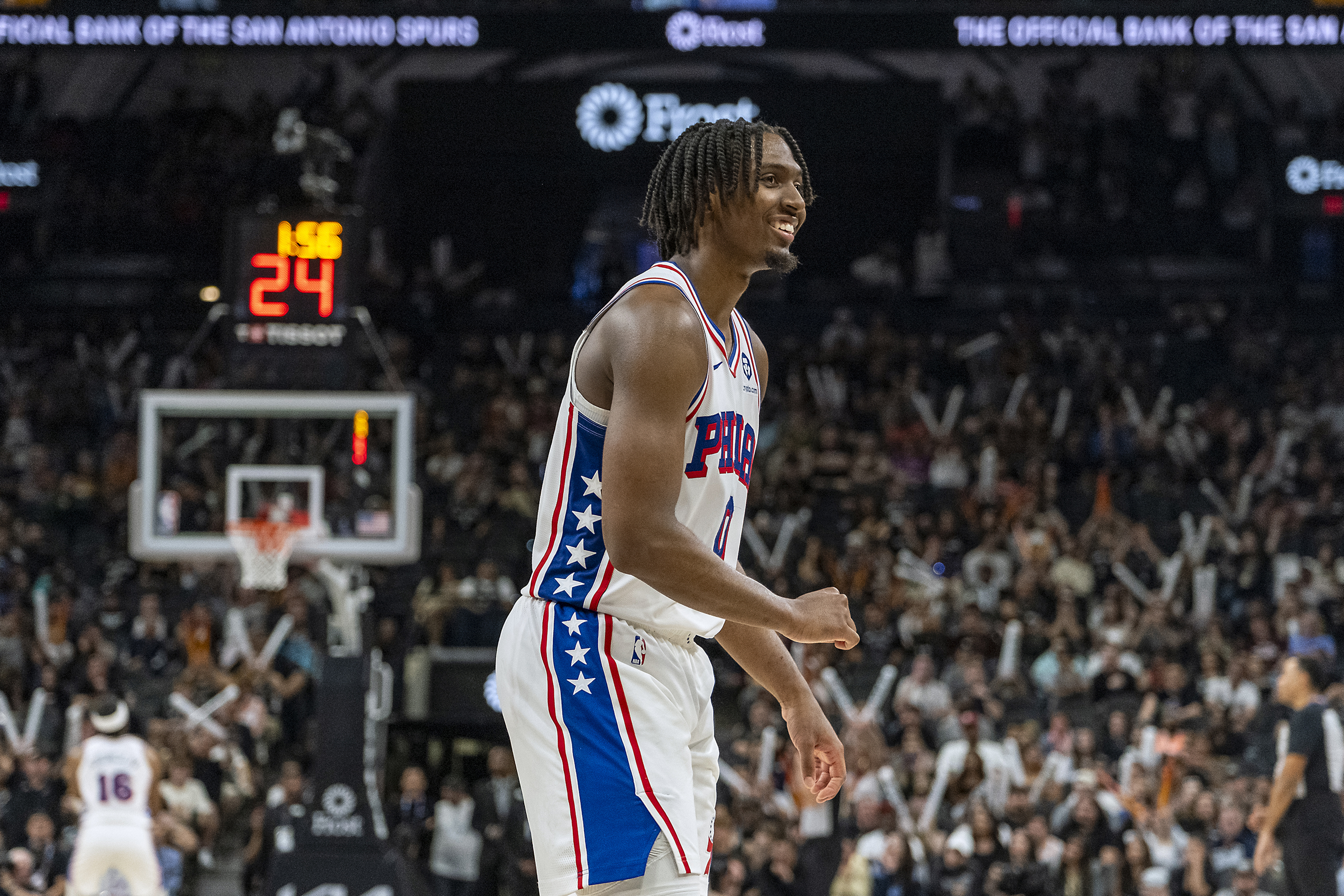 Philadelphia 76ers guard Tyrese Maxey (0) begins to celebrate during double overtime of an NBA basketball game against the San Antonio Spurs, Sunday, April 7, 2024, in San Antonio. 