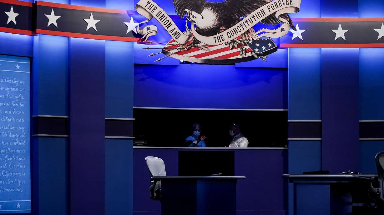 Crews put finishing touches at Kingsbury Hall at the University of Utah in Salt Lake City on Oct. 6, 2020, in preparation for the vice presidential debate. Three Libertarian presidential candidates will debate in Salt Lake City on April 19, the party said.