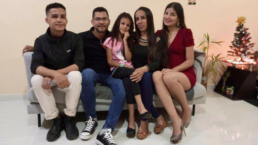 Alberto Marcano, second from left, is pictured in Venezuela with his family — son Victor, daughter Amanda, wife Arelys and daughter Victoria. He was hit by a car on I-15 and died on Thursday.