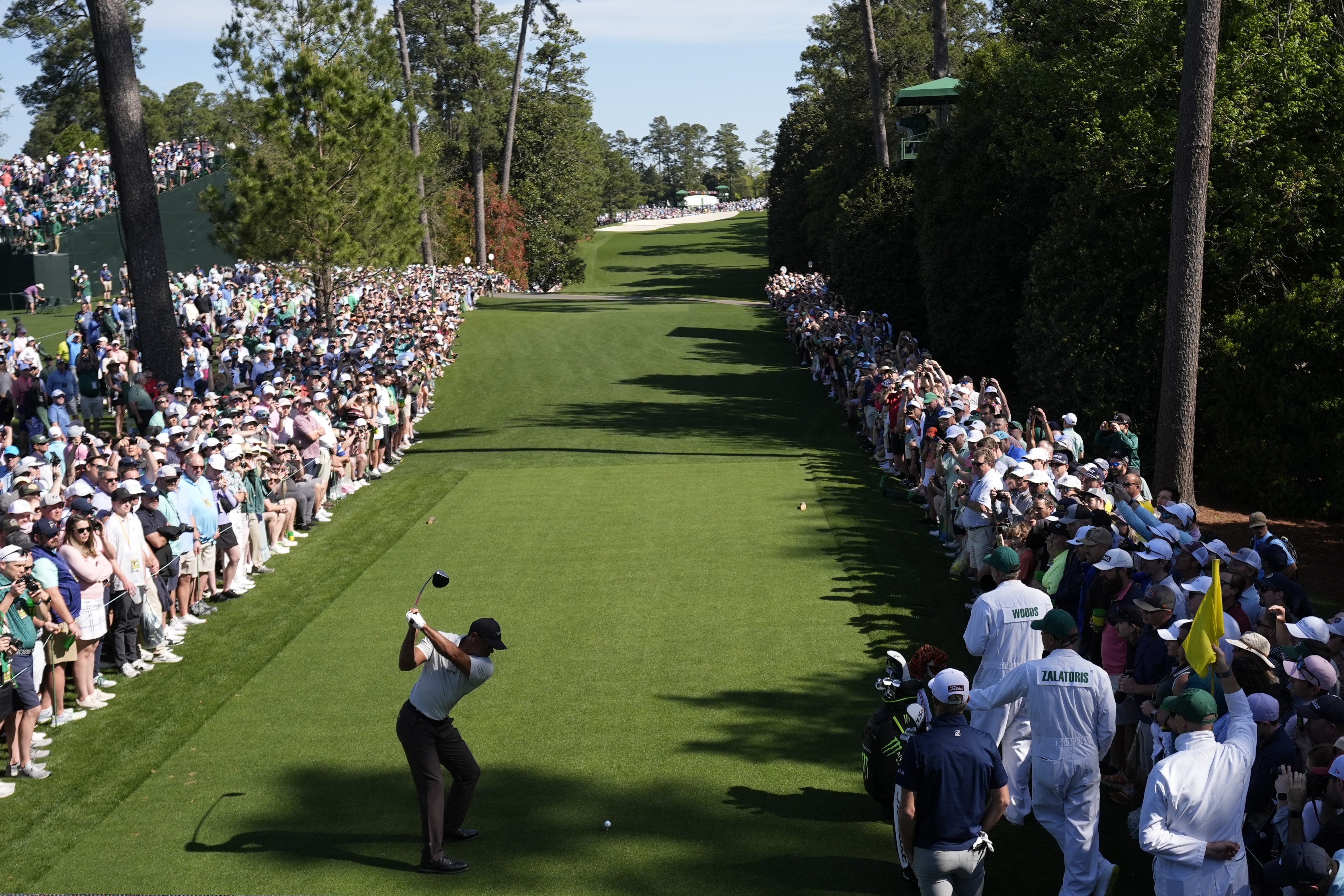 Tiger Woods tees off on the 18th hole during a practice round in preparation for the Masters golf tournament at Augusta National Golf Club Monday, April 8, 2024, in Augusta, Ga. 