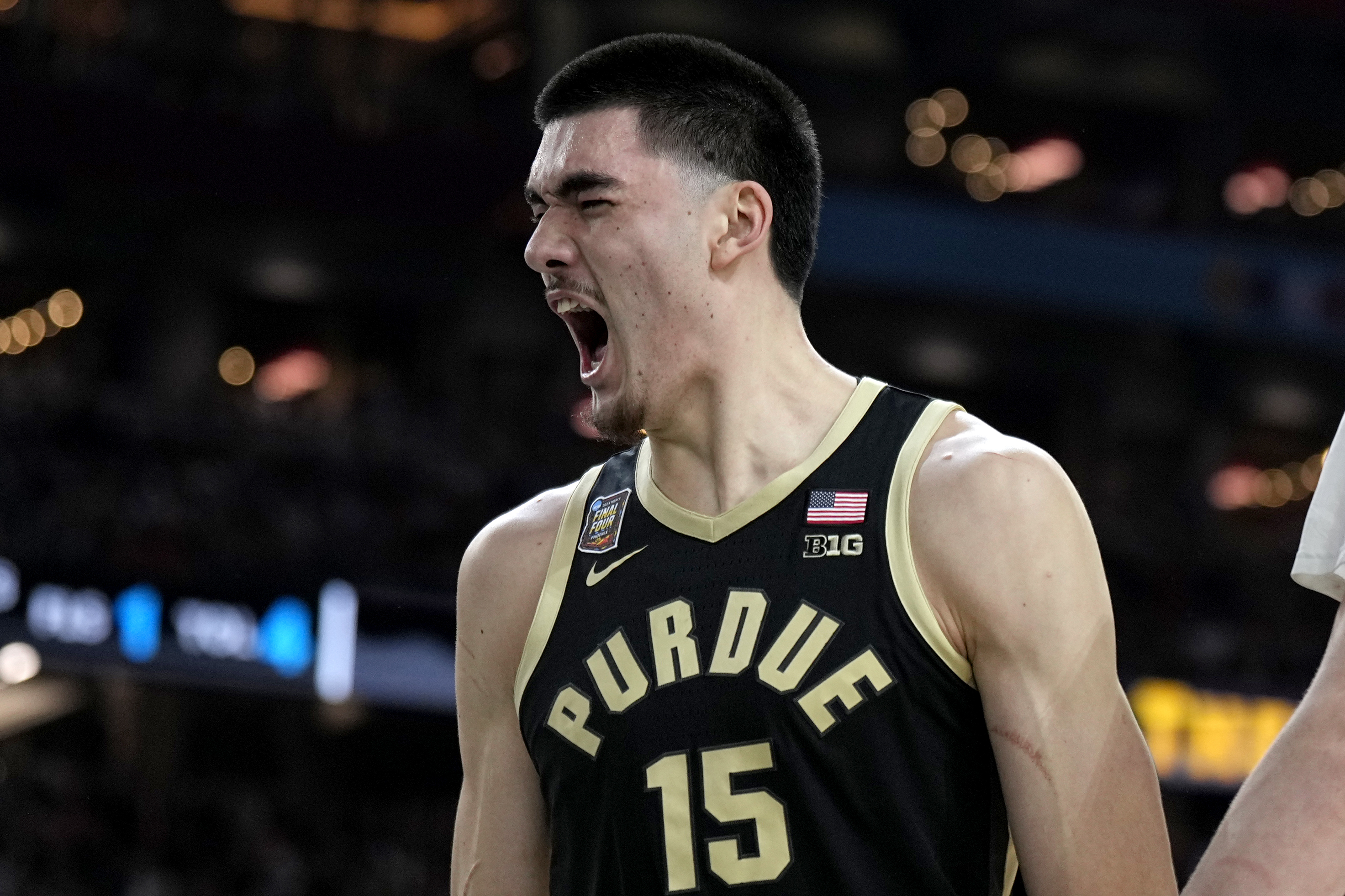 Purdue center Zach Edey celebrates after blocking a shot against UConn during the first half of the NCAA college Final Four championship basketball game, Monday, April 8, 2024, in Glendale, Ariz.
