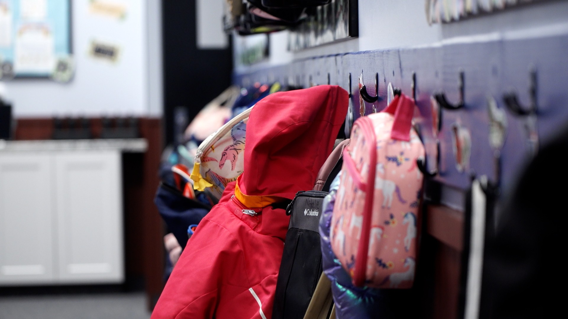 Backpacks and coats line the wall at American Preparatory Academy’s day care in Draper. Kids there were treated for exposure to carbon monoxide in November.