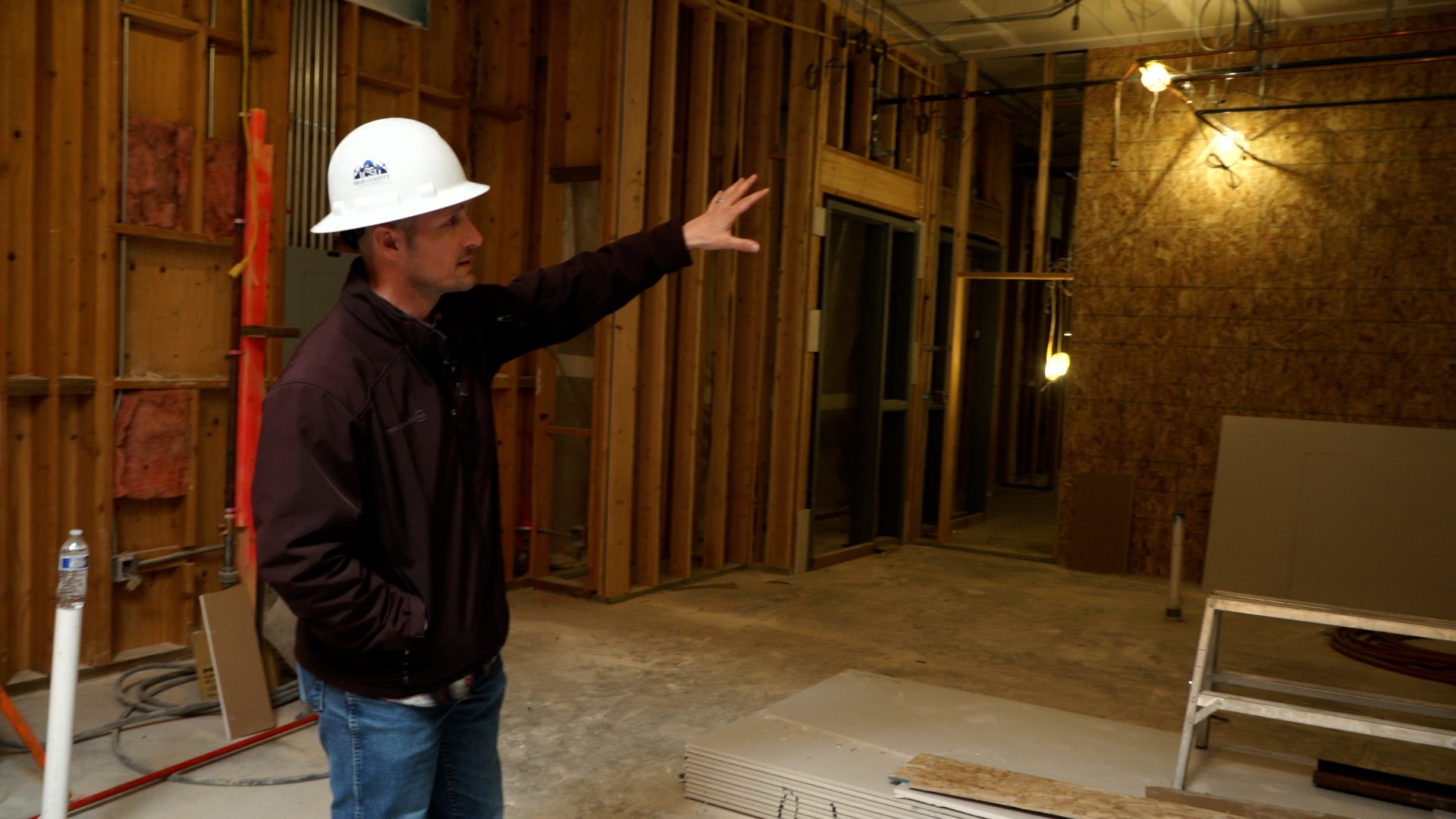 Hunter Shaheen with the Iron County School District points to classrooms under construction at Canyon View Middle School in Cedary City. Fumes from gas-powered equipment there sickened students in January.