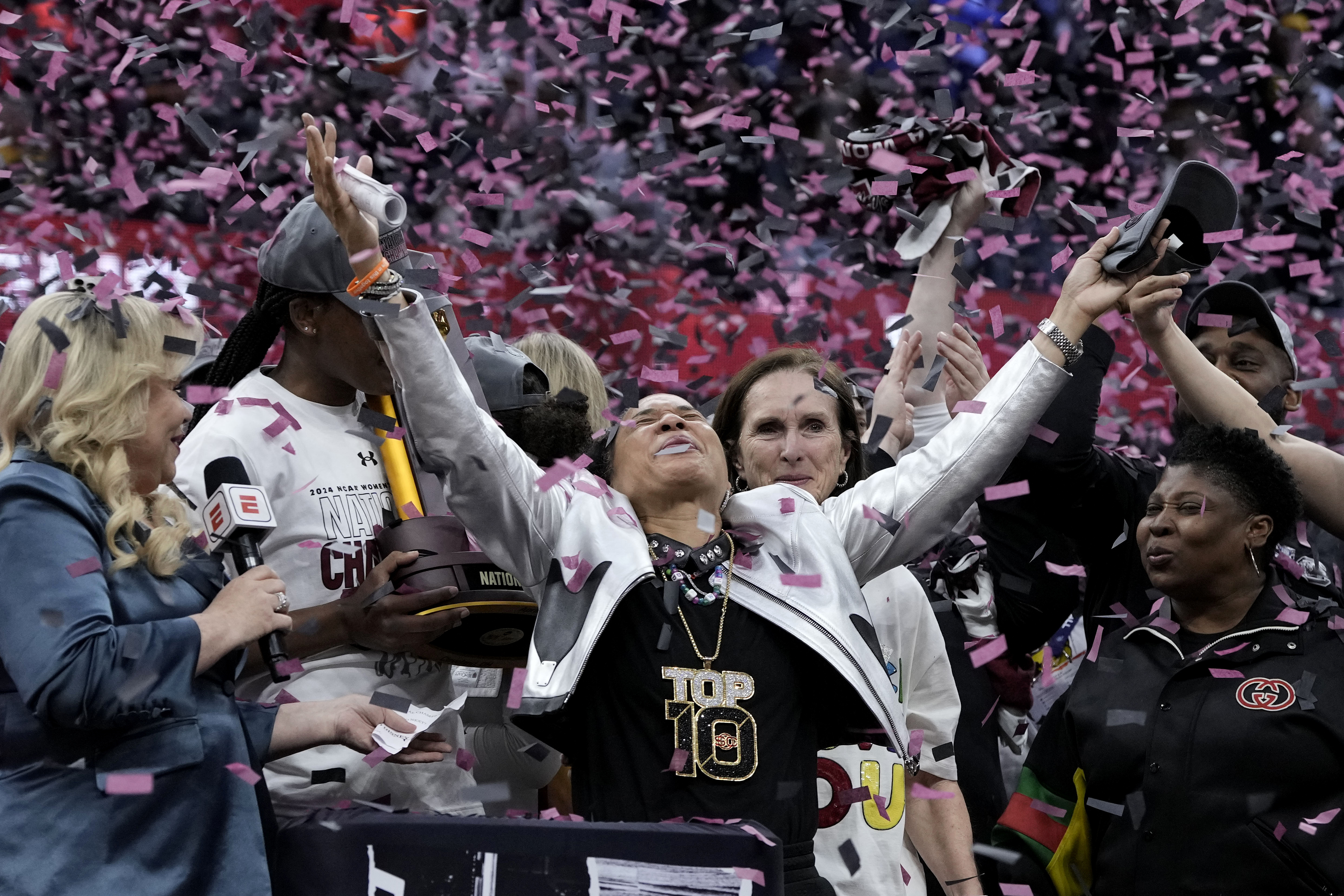 South Carolina head coach Dawn Staley celebrates after the Final Four college basketball championship game against Iowa in the women's NCAA Tournament, Sunday, April 7, 2024, in Cleveland. South Carolina won 87-75. 