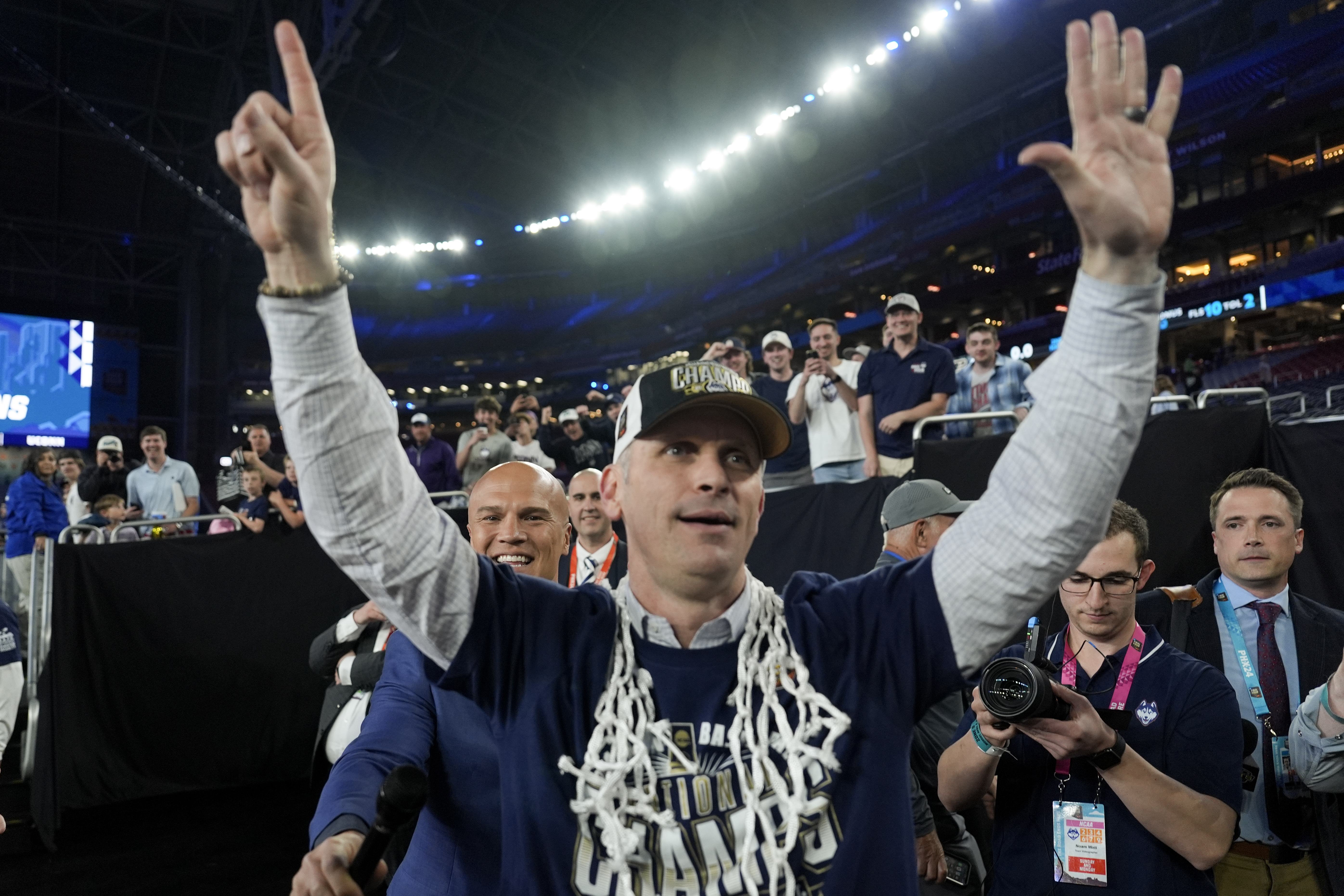 UConn head coach Dan Hurley greets fans after their win against Purdue in the NCAA college Final Four championship basketball game, Monday, April 8, 2024, in Glendale, Ariz. 
