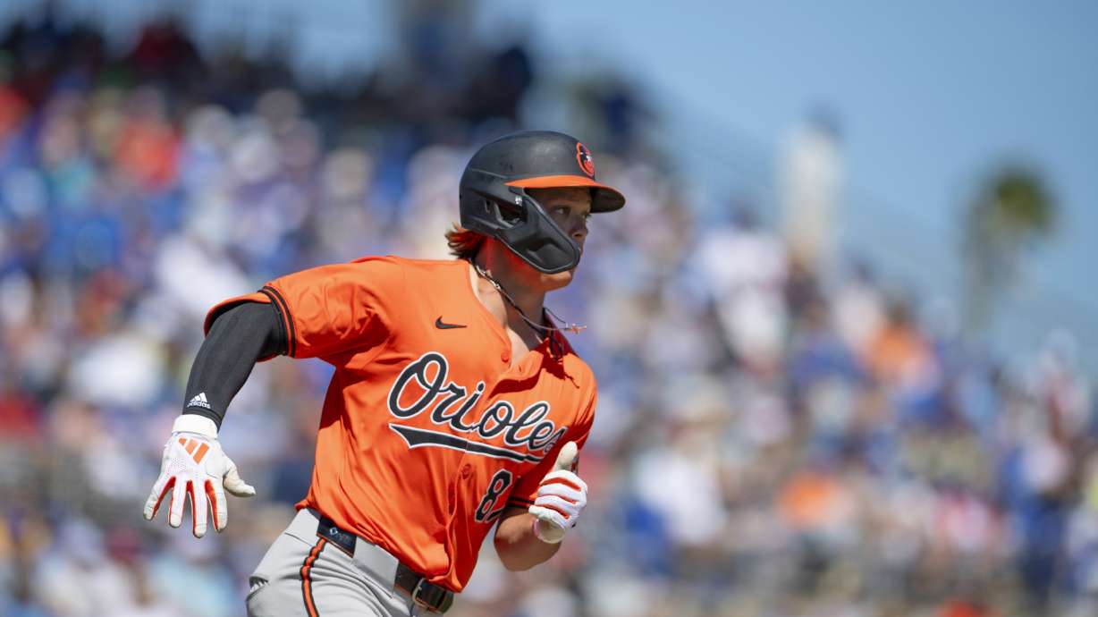 Baltimore Orioles second baseman Jackson Holliday rounds first base after hitting a home run during a baseball game against the Toronto Blue Jays, Tuesday, March 19, 2024, in Dunedin, Fla.