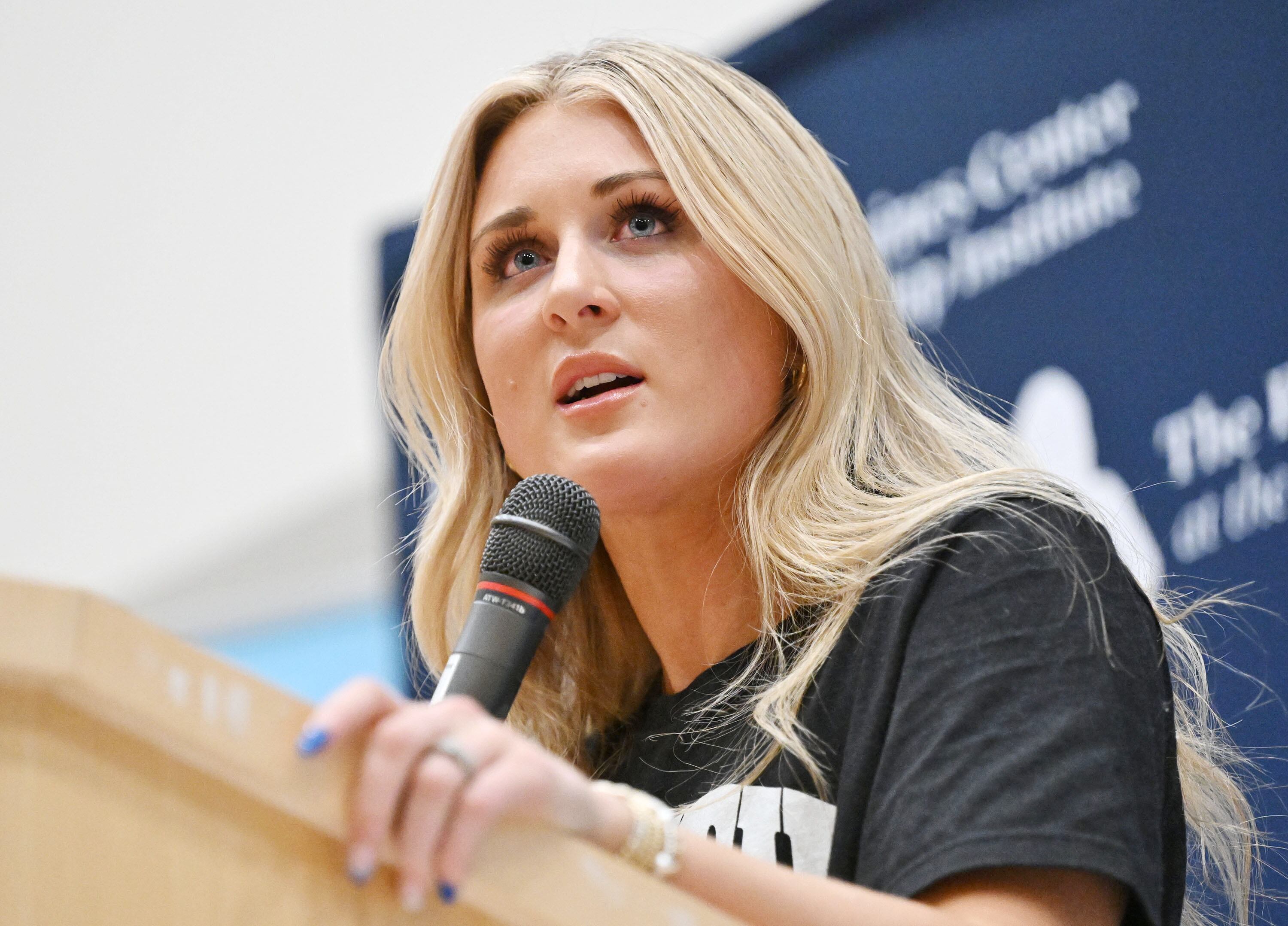 Swimmer-turned-activist Riley Gaines speaks at the Spencer Fox Eccles Business Building at the University of Utah in Salt Lake City about women's rights on Friday.