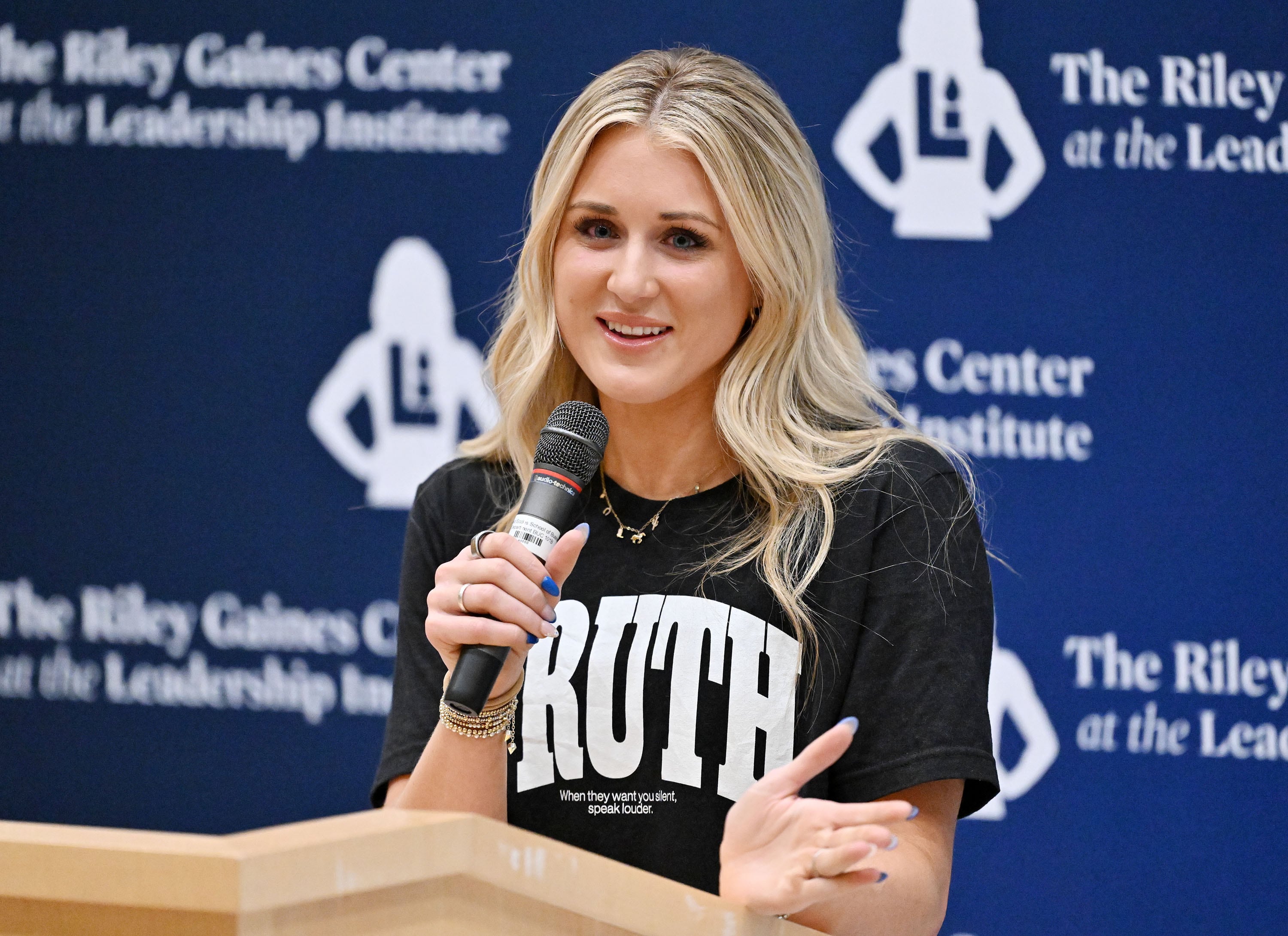 Swimmer-turned-activist Riley Gaines speaks at the Spencer Fox Eccles Business Building at the University of Utah in Salt Lake City about women's rights on Friday.