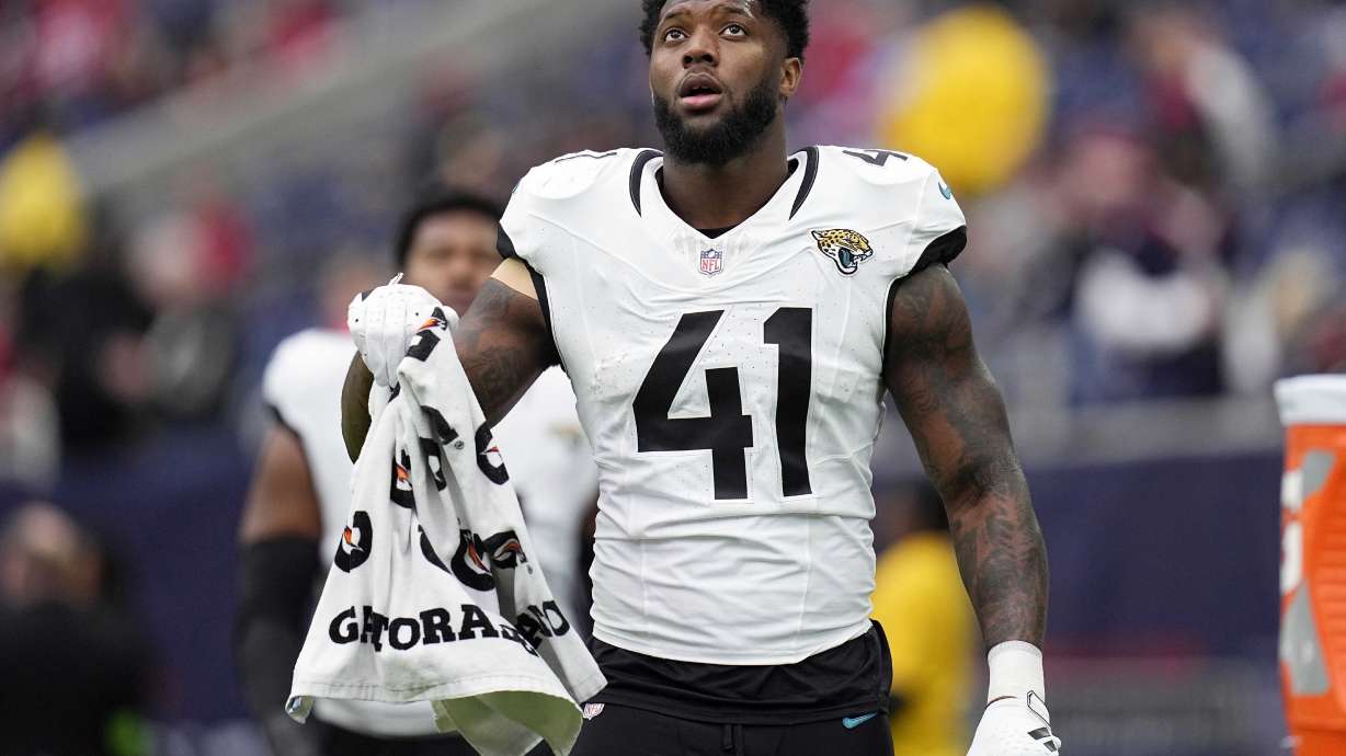 FILE -Jacksonville Jaguars linebacker Josh Allen (41) during an NFL football game against the Houston Texans Sunday, Nov. 26, 2023, in Houston. A person familiar with negotiations, Wednesday, April 10, 2024, says Allen and the Jacksonville Jaguars have reached agreement on a five-year, $150 million contract that includes $88 million guaranteed. The person spoke to The Associated Press on condition of anonymity because the deal had not officially been signed or announced.