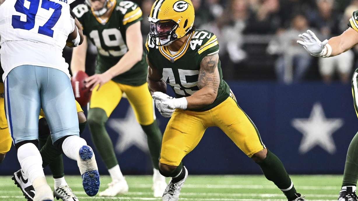 FILE- Green Bay Packers linebacker Eric Wilson (45) rushes during the first half against the Dallas Cowboys of an NFL wild-card playoff football game Sunday, Jan. 14, 2024 in Arlington, Texas. The Bay Packers have boosted their special teams by re-signing linebacker Eric Wilson.