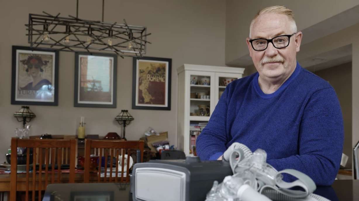 Jeffrey Reed experienced persistent sinus infections and two bouts of pneumonia while using a Philips CPAP machine, Oct. 20, 2022, in Marysville, Ohio. The sleep apnea machine company is barred from resuming production until it meets safety requirements.