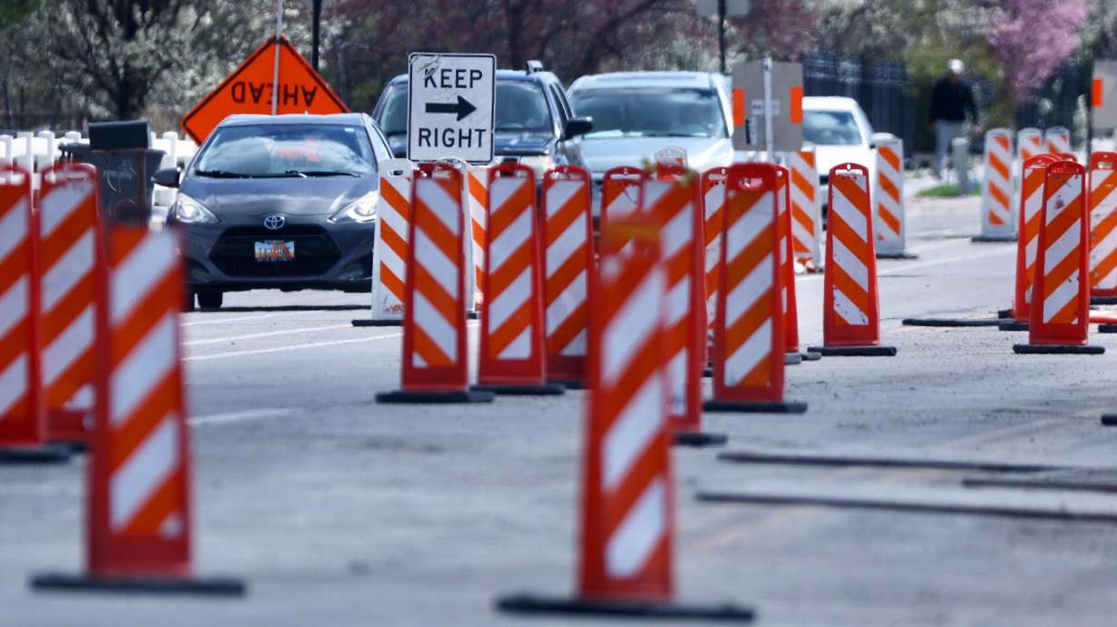 Vehicles navigate a construction zone in South Jordan on April 8. Expect to see construction workers and orange cones dotting Utah's roads this summer as the Utah Department of Transportation revs up 209 projects.