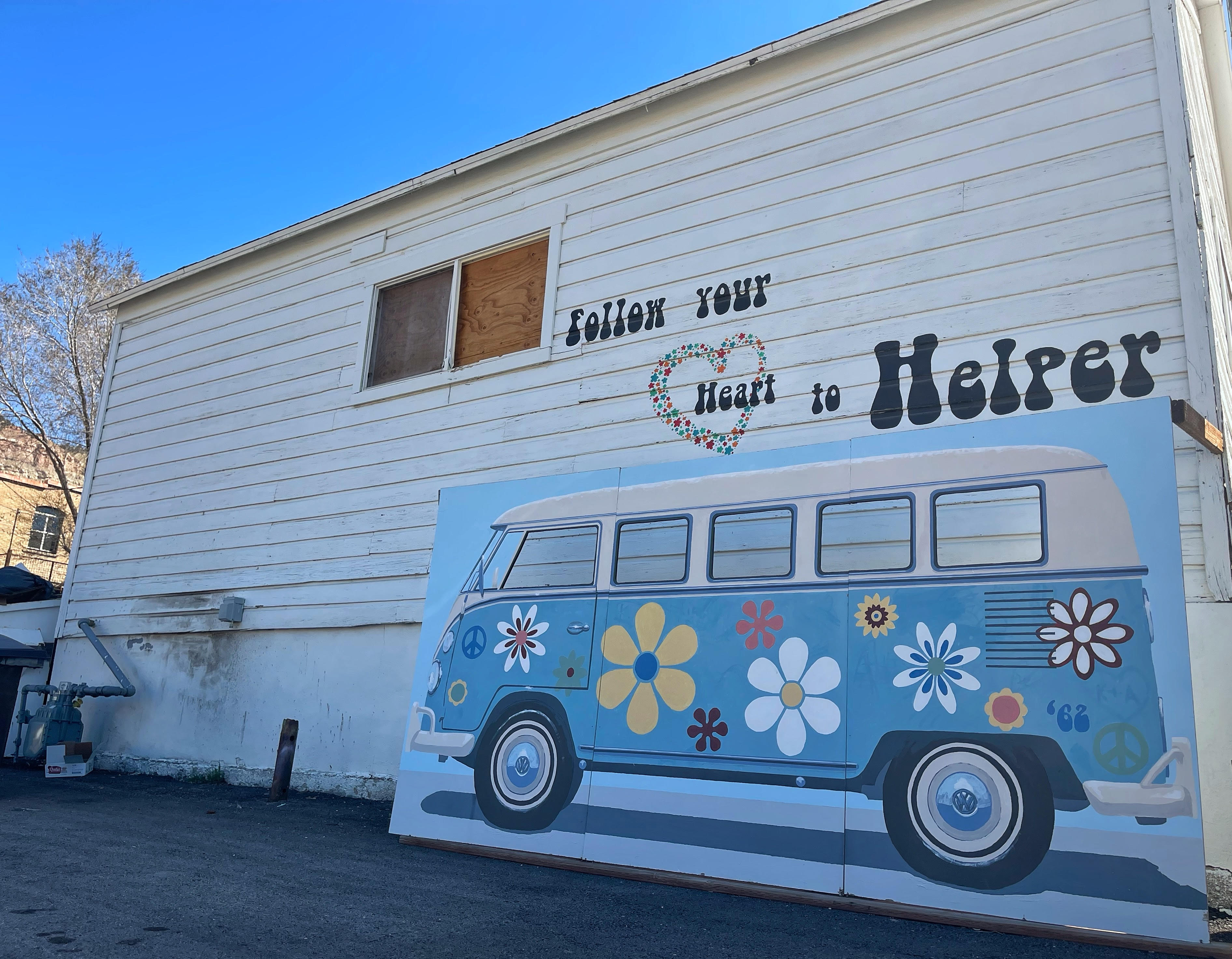 A mural painted on the back of a restaurant in Helper on Tuesday. Once a town on the brink of death after the downturn of the coal industry, Helper has weathered the storm on its way to becoming the best version of itself.