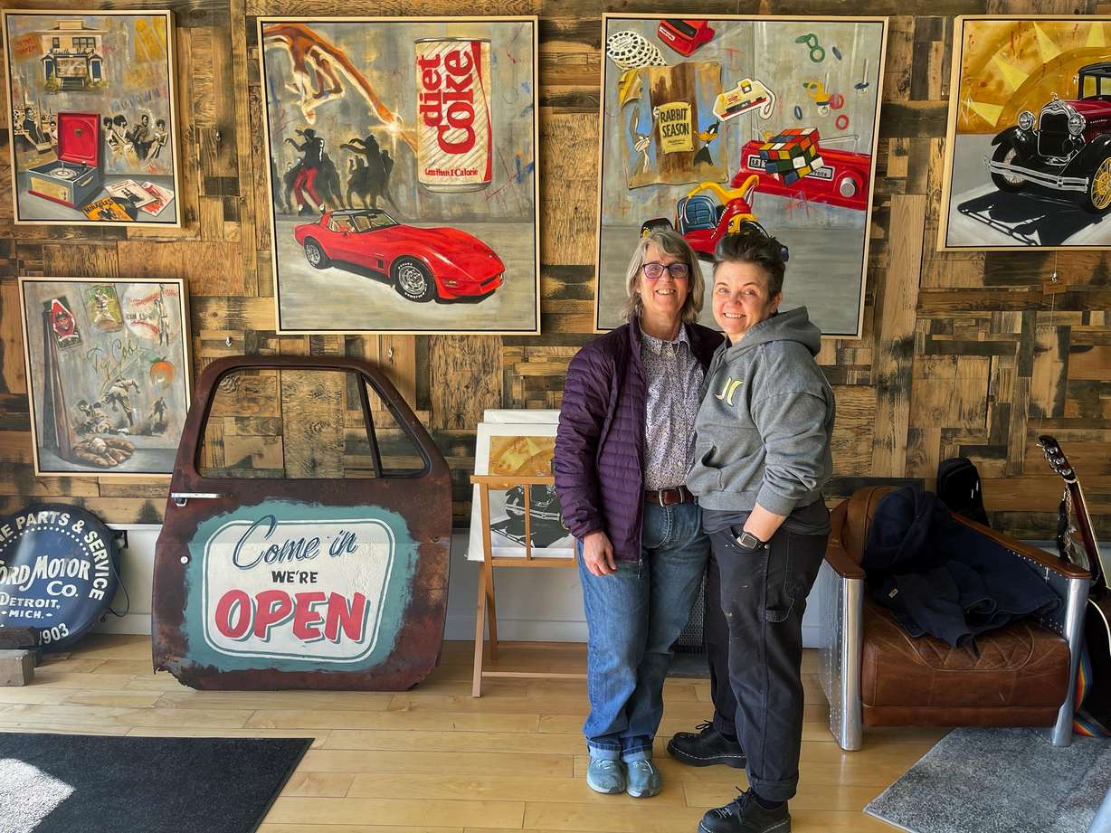 Helper Mayor Lenise Peterman, left, poses for a picture on Tuesday with her wife, Kate Kilpatrick, inside Kilpatrick's art gallery in Helper. Helper was once a town on the brink of death after the downturn of the coal industry but through resilience, community collaboration and proactive rural leadership, it has weathered the storm on its way to becoming the best version of itself.