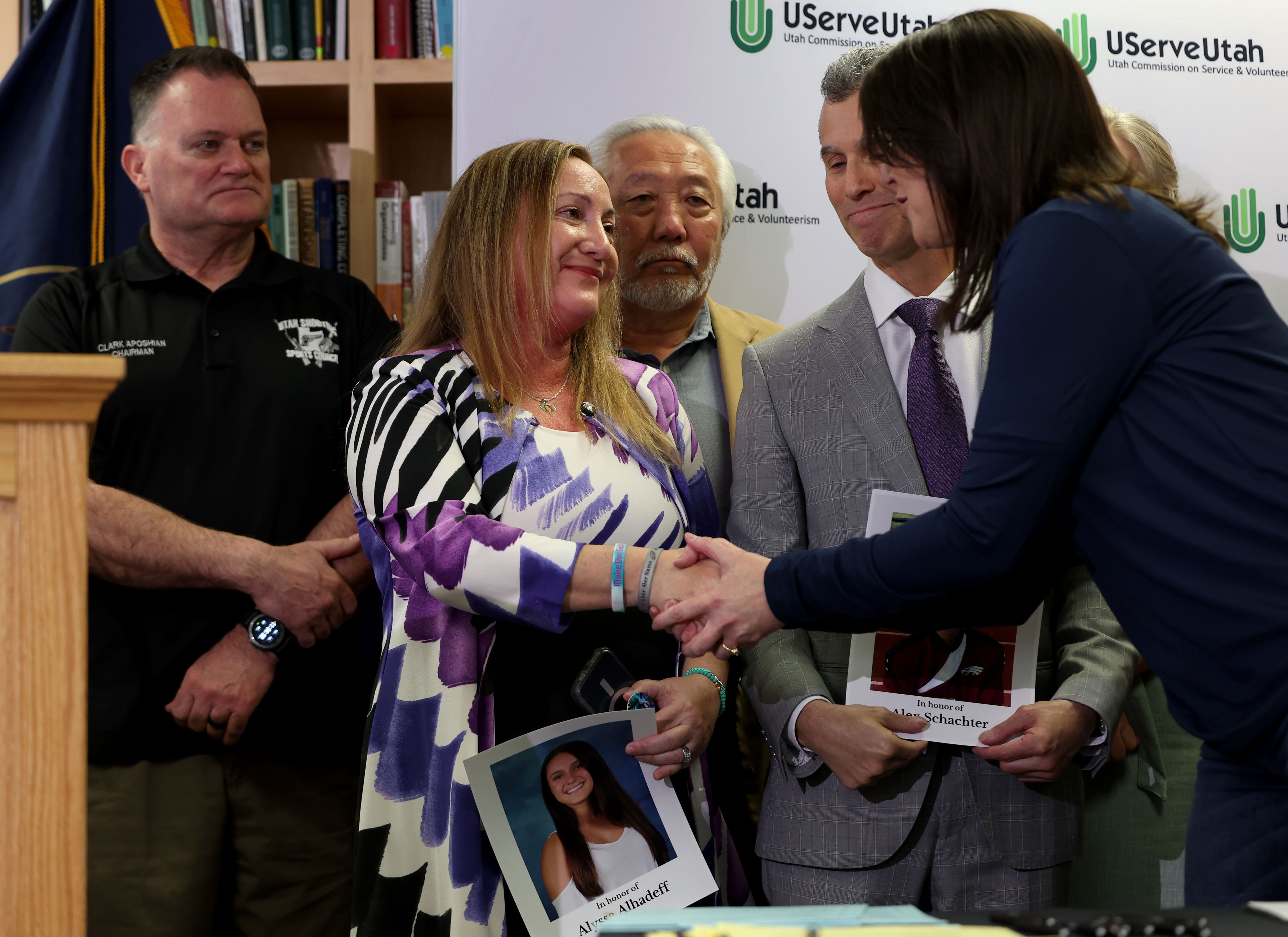 Lori Alhadeff, mother of Alyssa Alhadeff, shakes hands with Lt. Gov. Deidre Henderson following the signing of HB84, a comprehensive school safety reform bill, at the University of Utah Bennion Center in Salt Lake City on Wednesday. Alyssa was a victim of one of the deadliest school shootings in U.S. history when 14 students and three staff members were killed at Marjory Stoneman High School in Parkland, Florida, on Valentine’s Day in 2018.