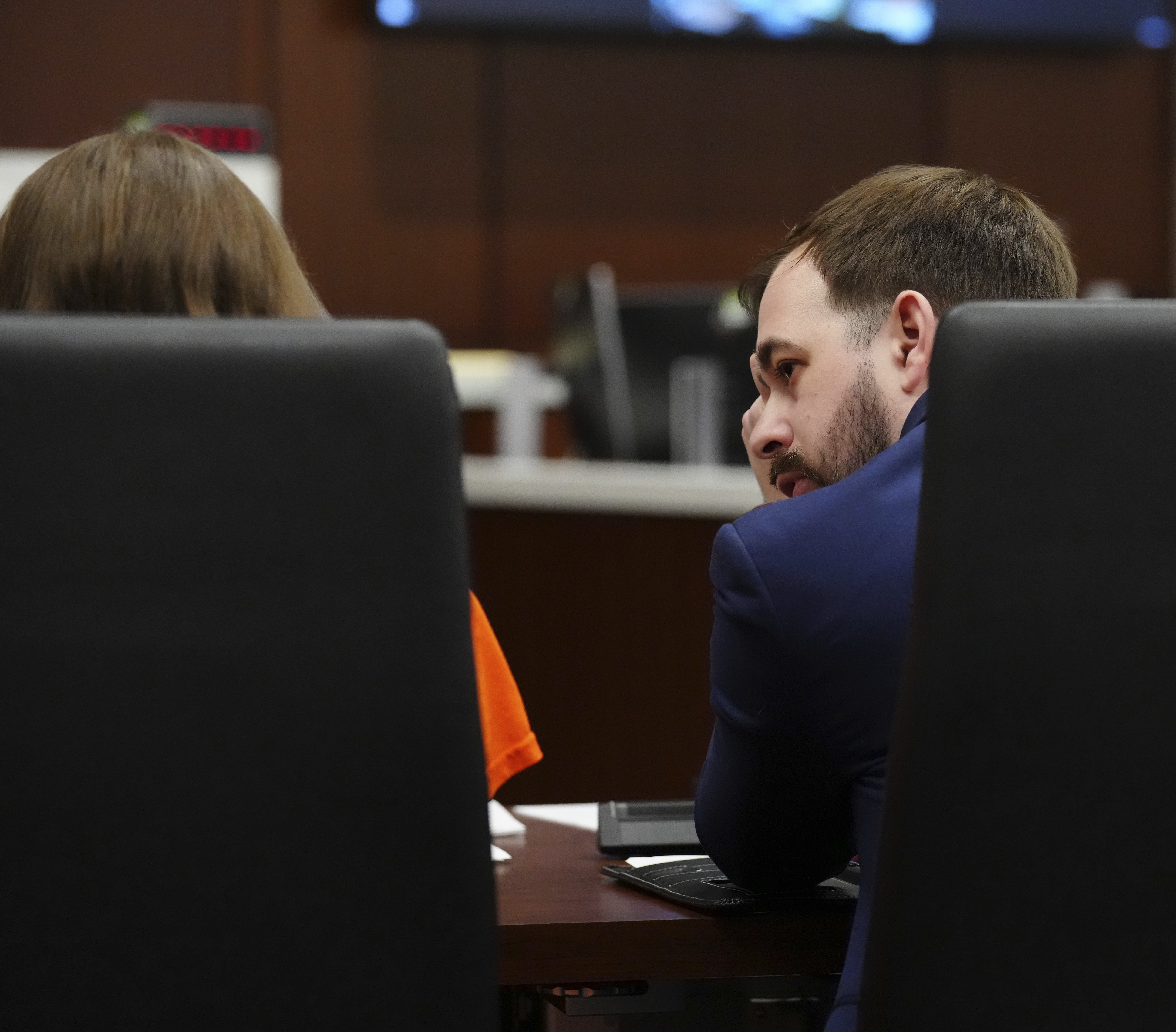 Attorney Brad Novreske speaks with Morgan Geyser in Waukesha County Circuit Court Wednesday, in Waukesha, Wis. Geyser, who at age 12 said she stabbed a classmate to please the online horror character Slender Man won't be released yet from a psychiatric hospital, a judge said Thursday.