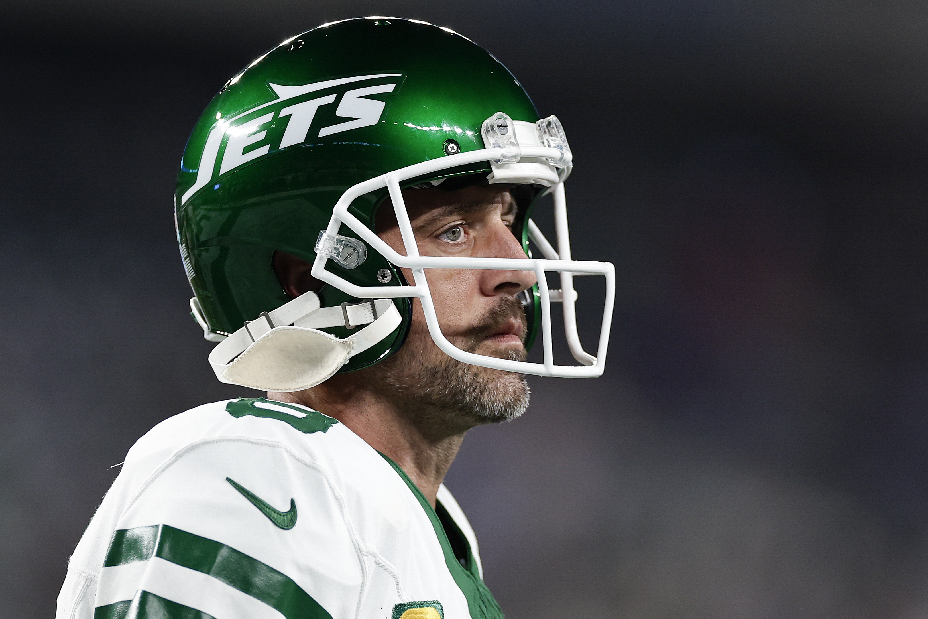 FILE - New York Jets quarterback Aaron Rodgers warms up before playing against the Buffalo Bills in an NFL football game, Sept. 11, 2023, in East Rutherford, N.J. On Tuesday, April 9, 2024, Aaron Rodgers acknowledged during a podcast interview this week he briefly thought his playing career could be over after he tore his left Achilles tendon in the New York Jets’ season opener. 