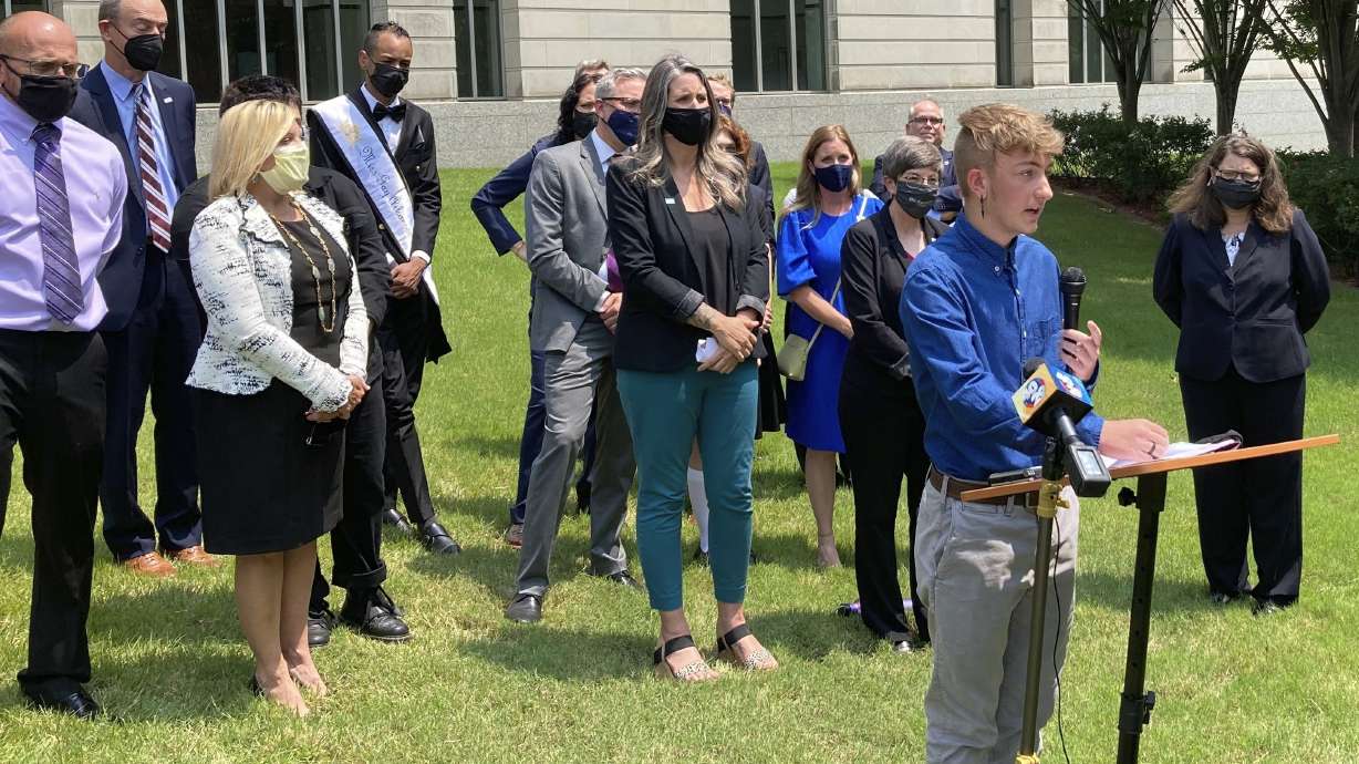 Dylan Brandt speaks at a news conference outside the federal courthouse in Little Rock, Ark., July 21, 2021. A federal appeals court is considering whether to reinstate Arkansas' ban on gender-related care for minors after hearing arguments.