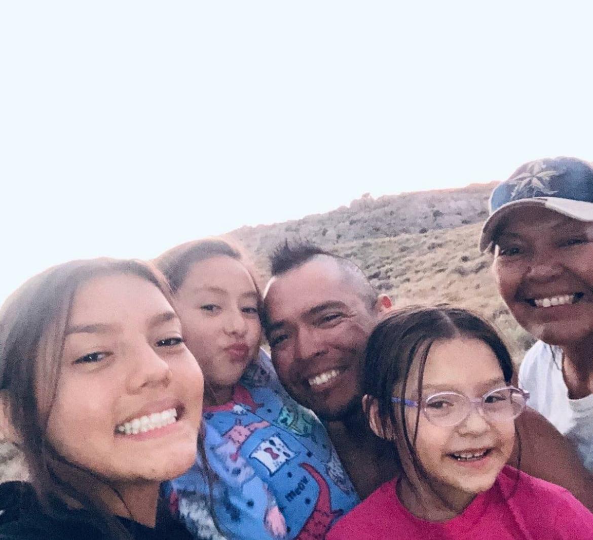 Uncle Thomas Yazzie with his mother Francine Yazzie and nieces including Taelyn Yazzie on the left.