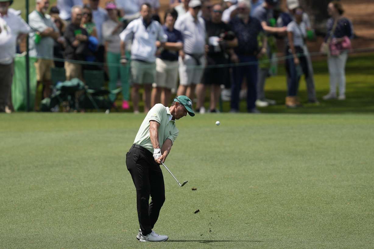 Mike Weir, of Canada, hits from the fairway on the second hole during the first round at the Masters golf tournament at Augusta National Golf Club Thursday, April 11, 2024, in Augusta, Ga.