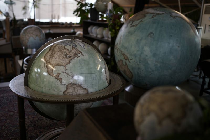 Various sizes of globes are displayed at a studio in London, Feb. 27.