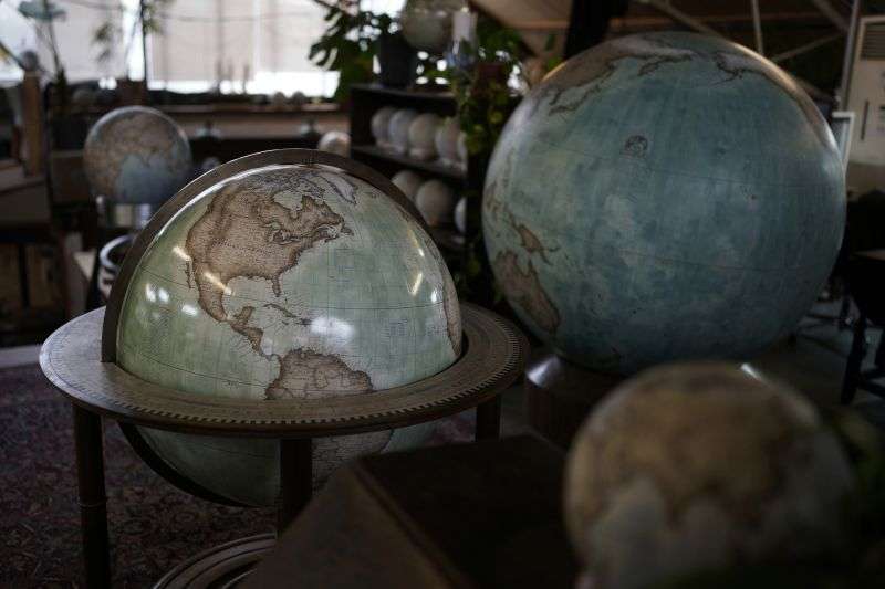 Various sizes of globes are displayed at a studio in London, Feb. 27.