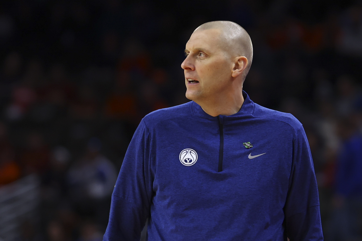 BYU head coach Mark Pope watches as his team played against Duquesne in the first half of a first-round college basketball game in the NCAA Tournament, Thursday, March 21, 2024, in Omaha, Neb. 