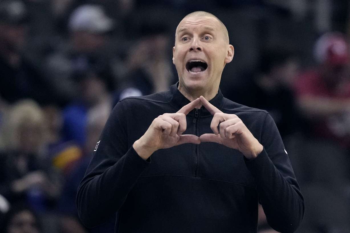 BYU head coach Mark Pope talks to his players during the first half of an NCAA college basketball game against Texas Tech in the quarterfinal round of the Big 12 Conference tournament, Thursday, March 14, 2024, in Kansas City, Mo. Kentucky has hired BYU’s Mark Pope as men’s basketball coach, bringing home a member of the Wildcats’ 1996 national championship team to succeed John Calipari. The school announced Pope’s hiring in a release Friday morning, April 12.