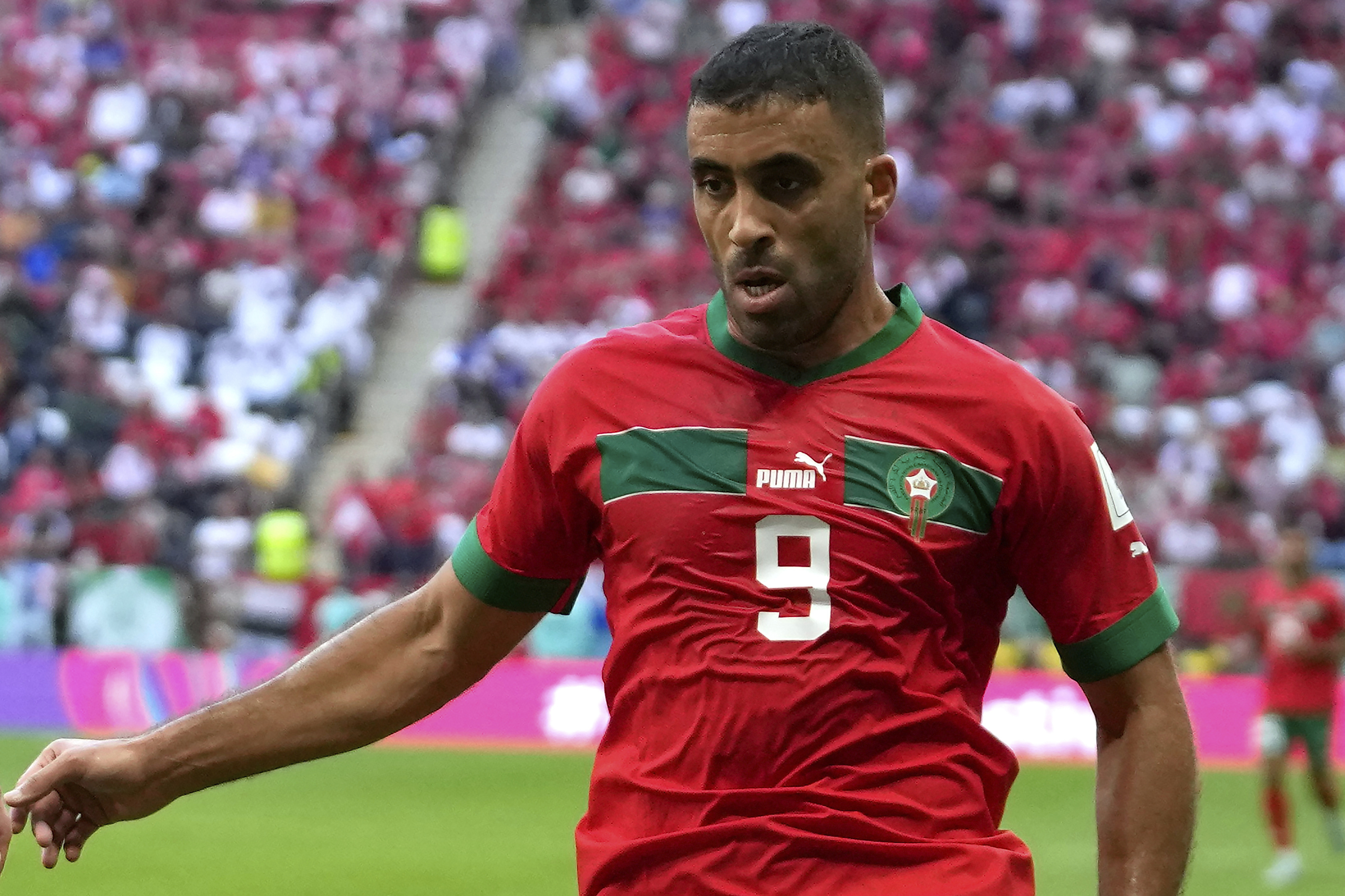 FILE -Morocco's Abderrazak Hamdallah in action during the World Cup group F soccer match between Morocco and Croatia, at the Al Bayt Stadium in Al Khor, Qatar, Wednesday, Nov. 23, 2022. A fan at the Saudi Super Cup final lashed an Al-Ittihad player with a whip during a confrontation moments after the match Thursday night. 