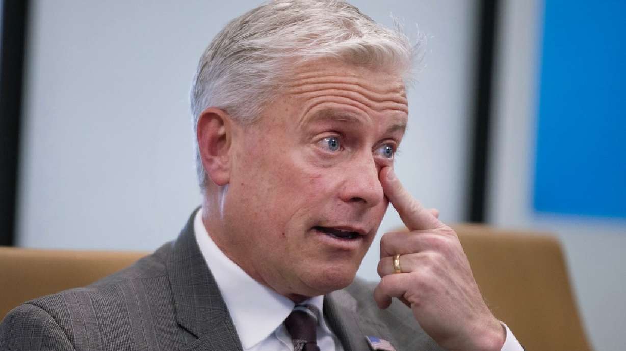 U.S. Senate candidate Jason Walton wipes tears from his eye while speaking about his daughter during a Deseret News Editorial Board meeting at the Deseret News office in Salt Lake City on Thursday.