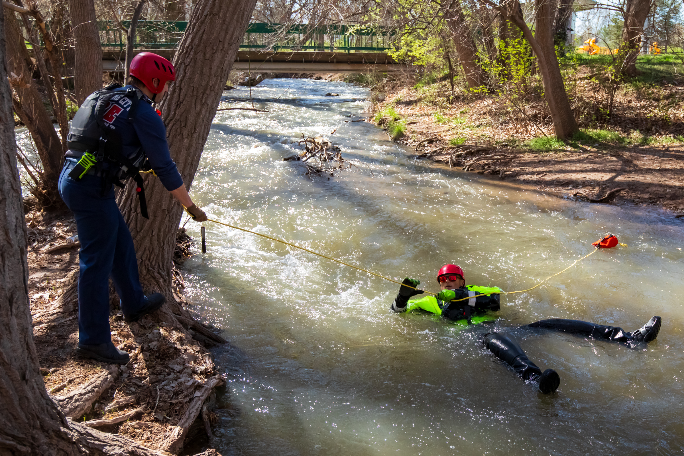 Christopher George, a paramedic for the Salt Lake City Fire Department, is hauled in from Parleys Creek during a swift water rescue demonstration at Sugar House Park in Salt Lake City on Friday. Above-normal streamflows are expected throughout Utah over the coming months as the state's snowpack melts.