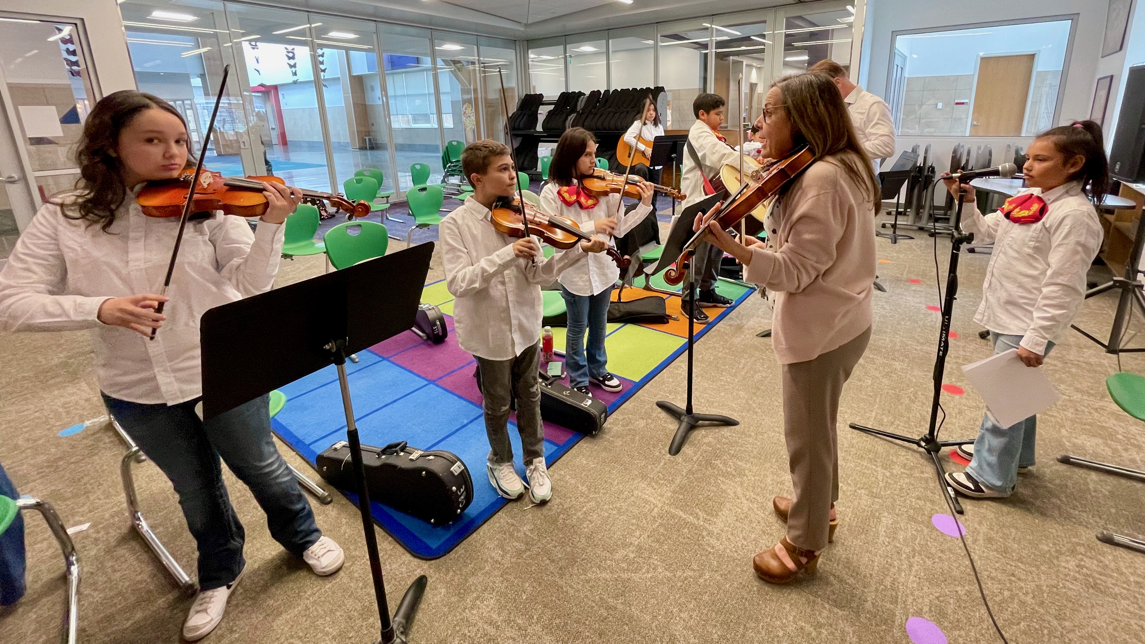 Ogden School District music instructor Janet Epperson instructs the members of the after-school mariachi group at East Ridge Elementary on Tuesday.