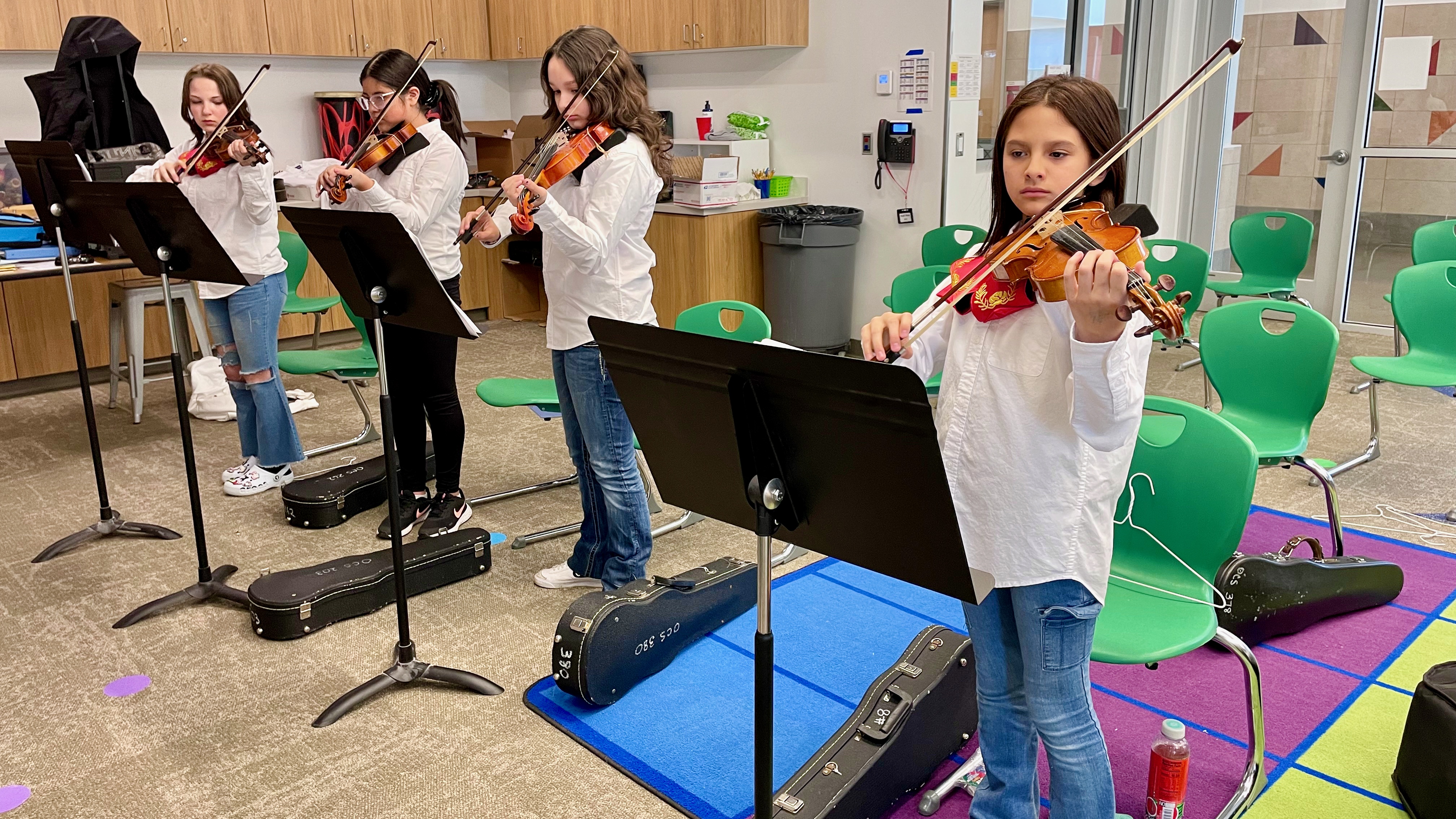 Members of the after-school mariachi group at East Ridge Elementary in Ogden practice on Tuesday.