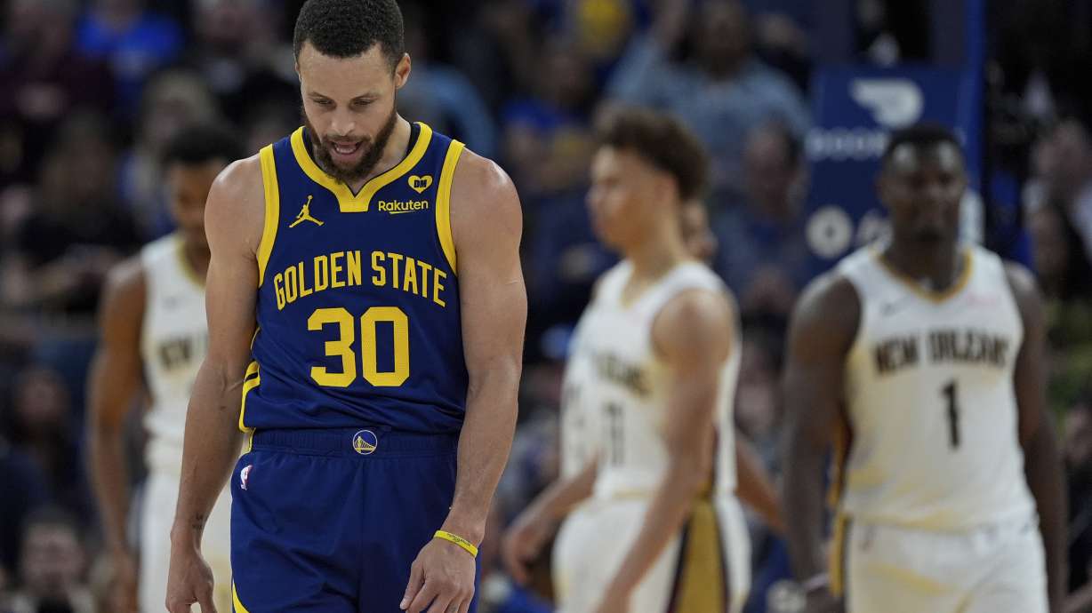 Golden State Warriors guard Stephen Curry (30) reacts after missing a shot against the New Orleans Pelicans during the second half of an NBA basketball game Friday, April 12, 2024, in San Francisco.