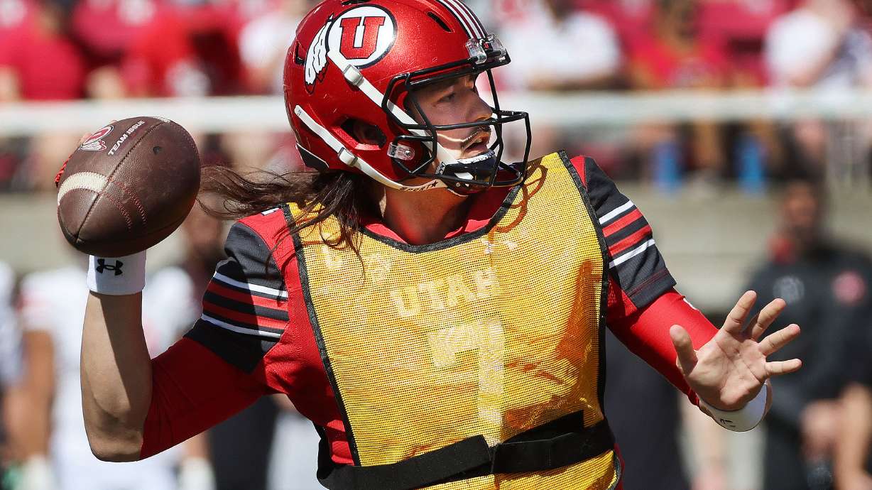 Utah Utes quarterback Cameron Rising (7) throws a touchdown pass during the 22 Forever game scrimmage in Salt Lake City on Saturday, April 13, 2024.