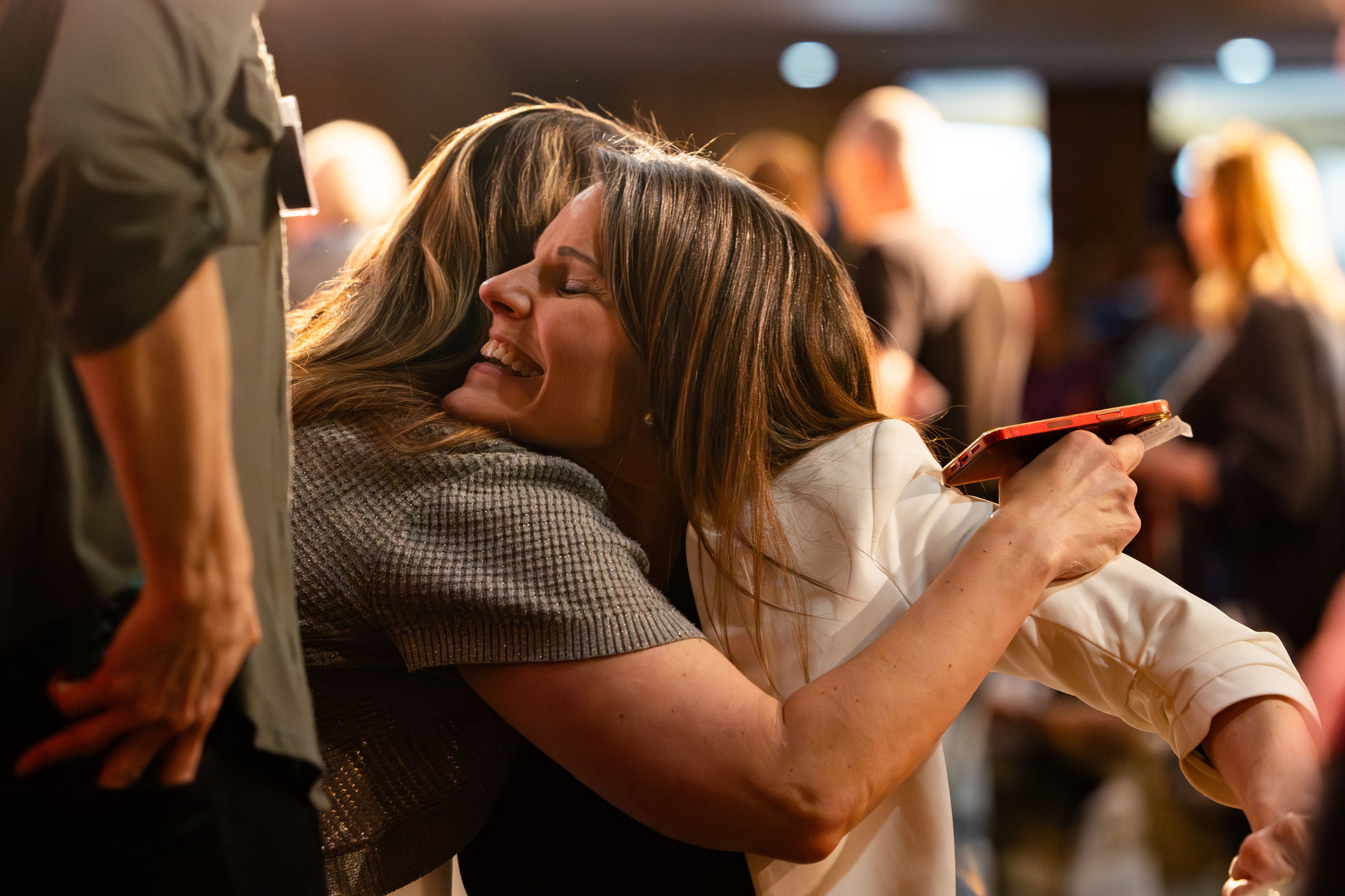 Embattled State School Board member Natalie Cline hugs a supporter during the breakout session of the Salt Lake County GOP Convention Saturday at Cottonwood High in Murray. Delegates voted for Amanda Bollinger over Cline.