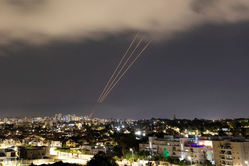 An anti-missile system operates after Iran launched drones and missiles toward Israel, as seen from Ashkelon, Israel Sunday.