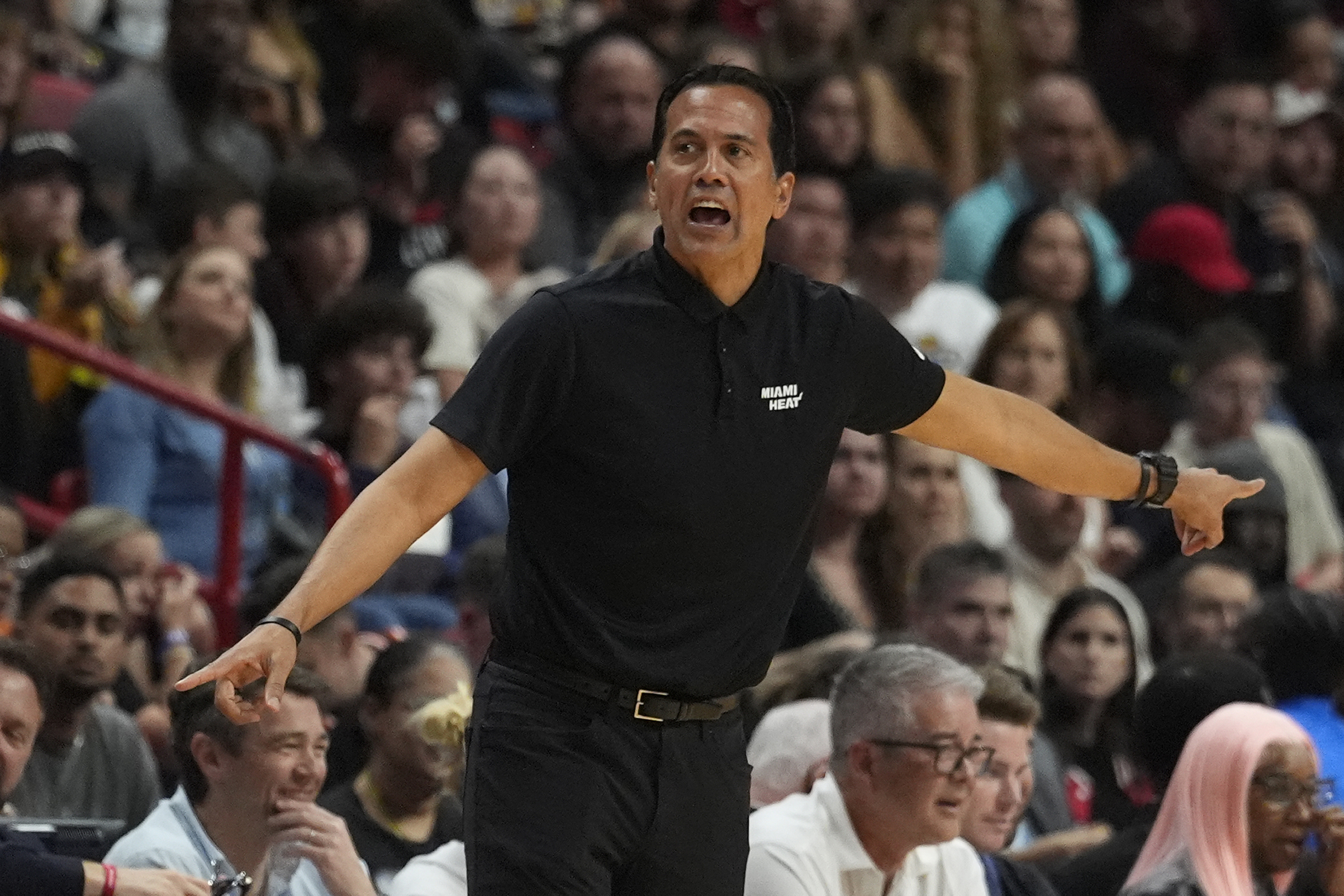 Miami Heat coach Erik Spoelstra gestures during the second half of an NBA basketball game against the Toronto Raptors, Friday, April 12, 2024, in Miami. 