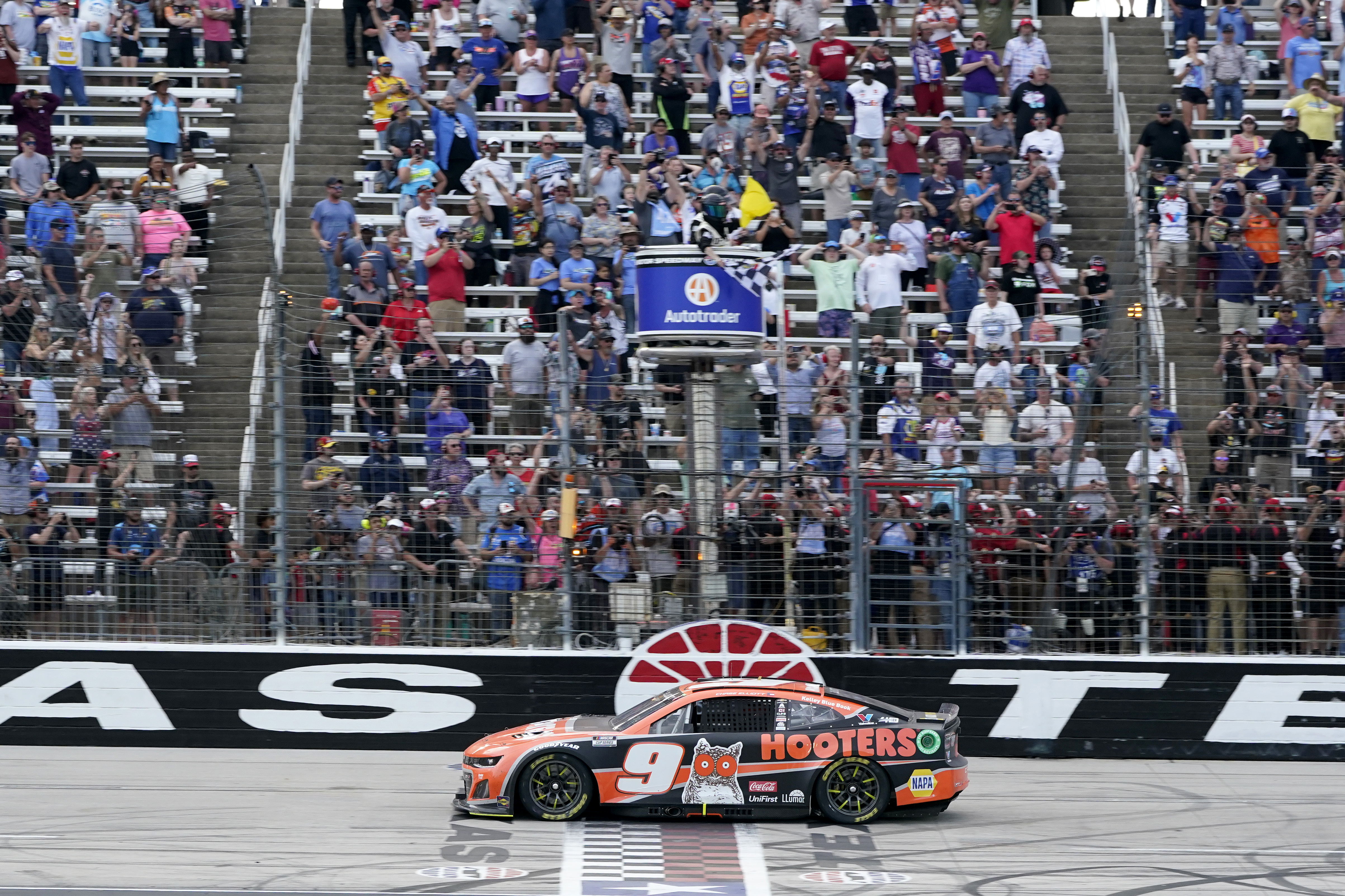 Chase Elliott crosses the finish line to win a NASCAR Cup Series auto race at Texas Motor Speedway in Fort Worth, Texas, Sunday, April 14, 2024. 