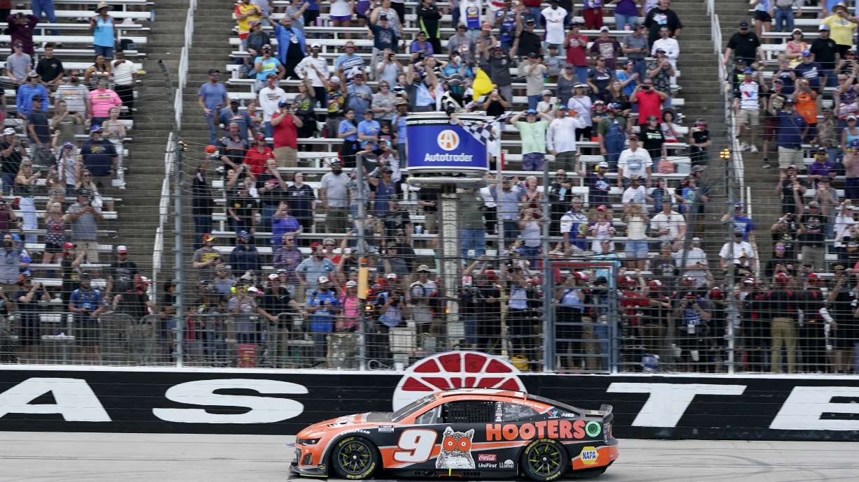 Chase Elliott crosses the finish line to win a NASCAR Cup Series auto race at Texas Motor Speedway in Fort Worth, Texas, Sunday, April 14, 2024.