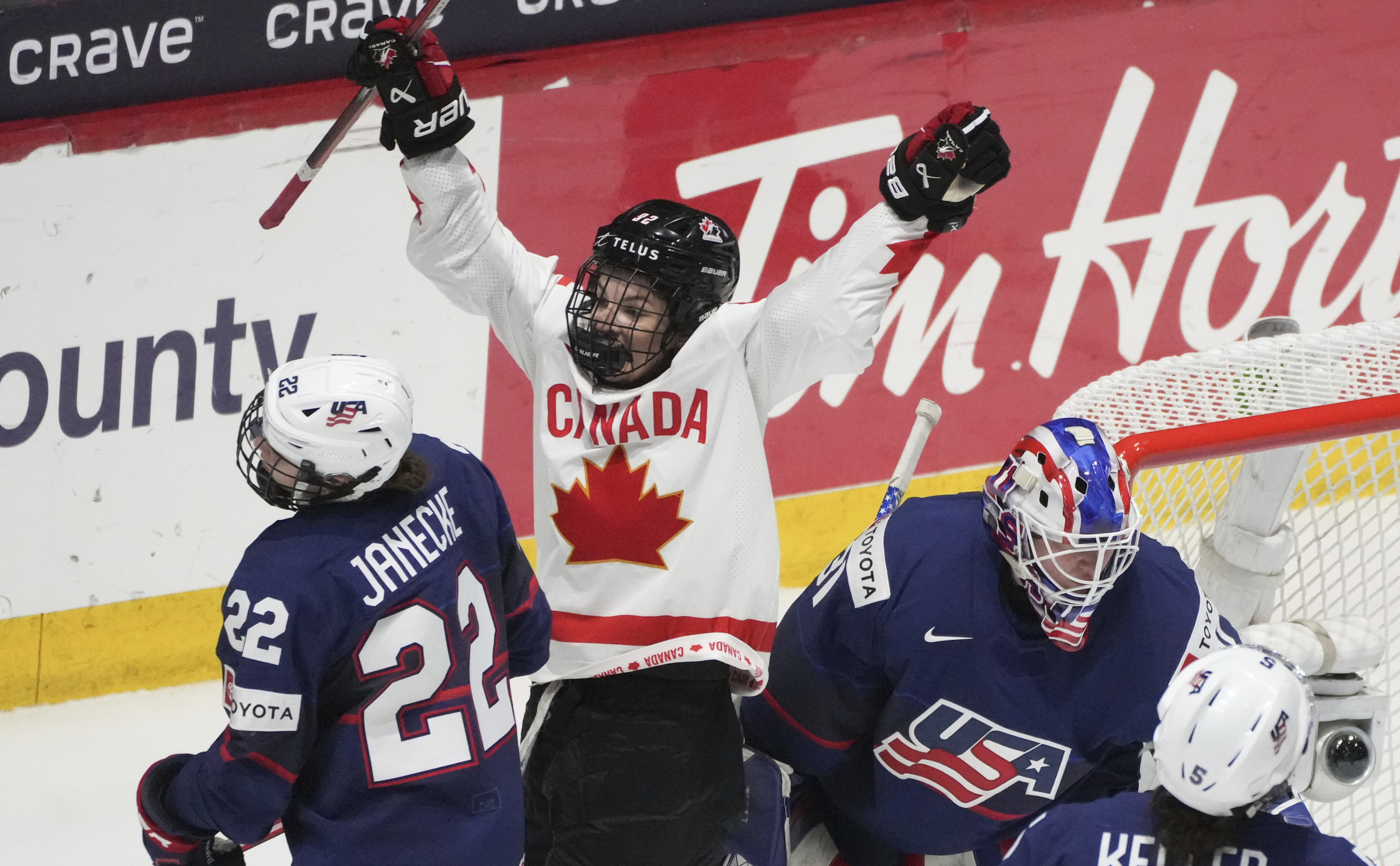 Canada's Danielle Serdachny (92) celebrates the goal by teammate Marie-Philip Poulin, not shown, over United States goaltender Aerin Frankel (31) during the second period in the final at the IIHF Women's World Hockey Championships in Utica, N.Y., Sunday, April 14, 2024.